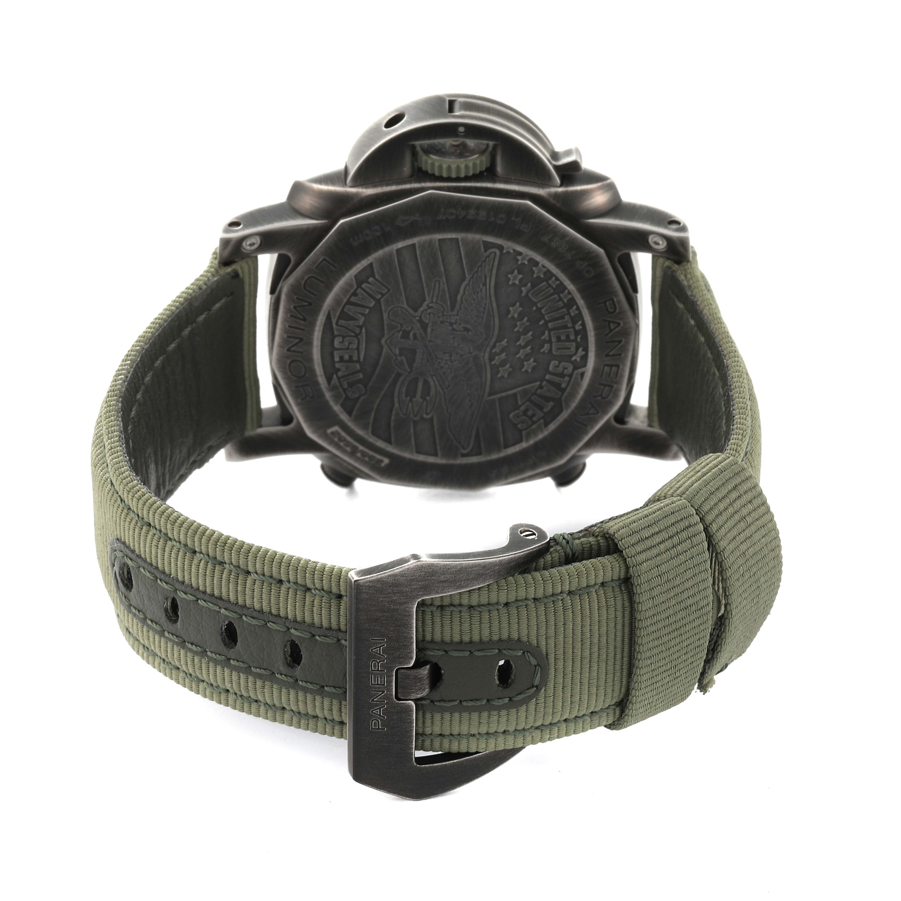 This image shows the back of a Panerai Luminor PAM01409 Men's Stainless Steel Grey Dial PAM01409 Men's Stainless Steel Grey Dial watch including its case back and green nylon strap with a buckle.