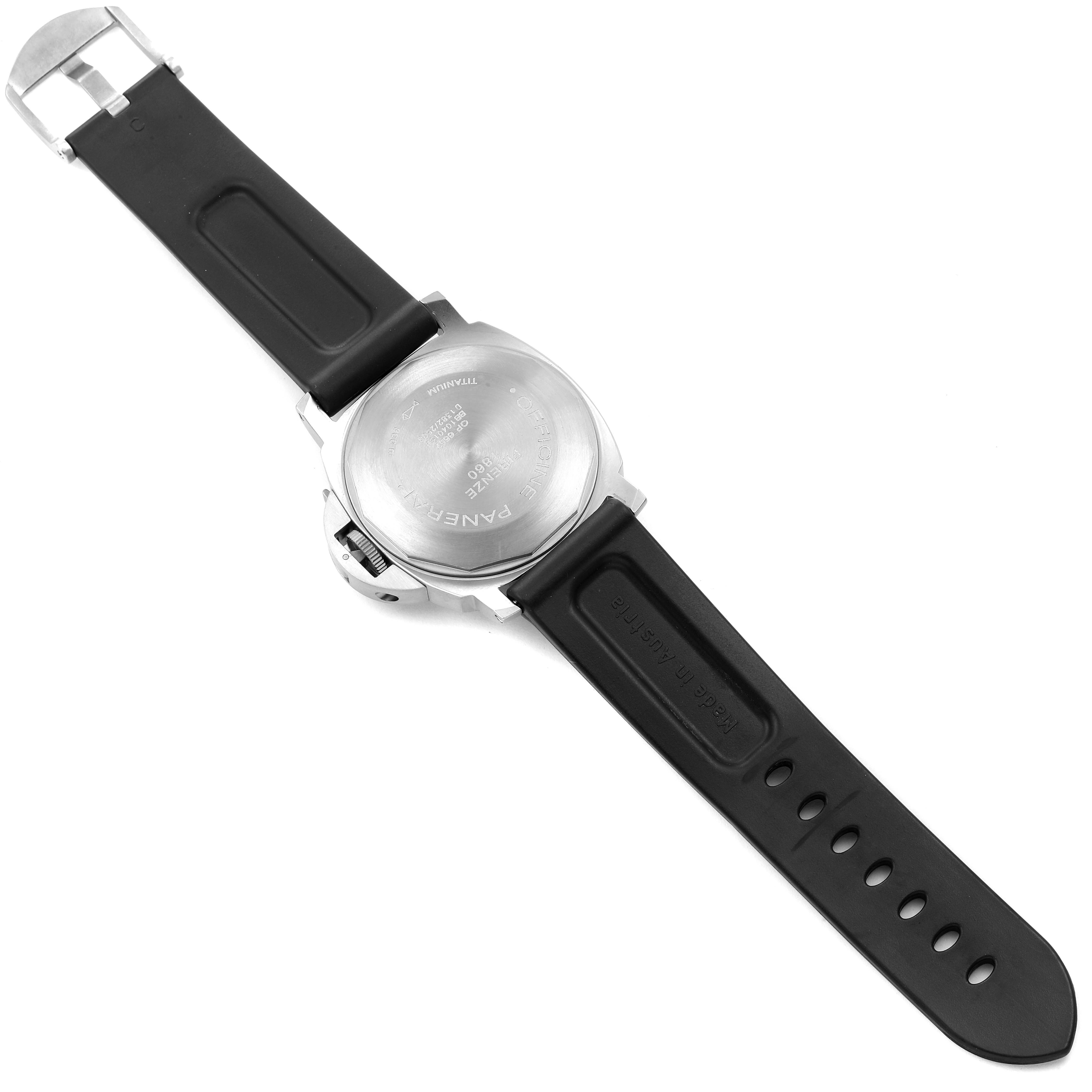 The image shows the back view of a Panerai Luminor PAM00093 Men's Titanium Blue Dial PAM00093 Men's Titanium Blue Dial watch with a black rubber strap and a titanium case back.