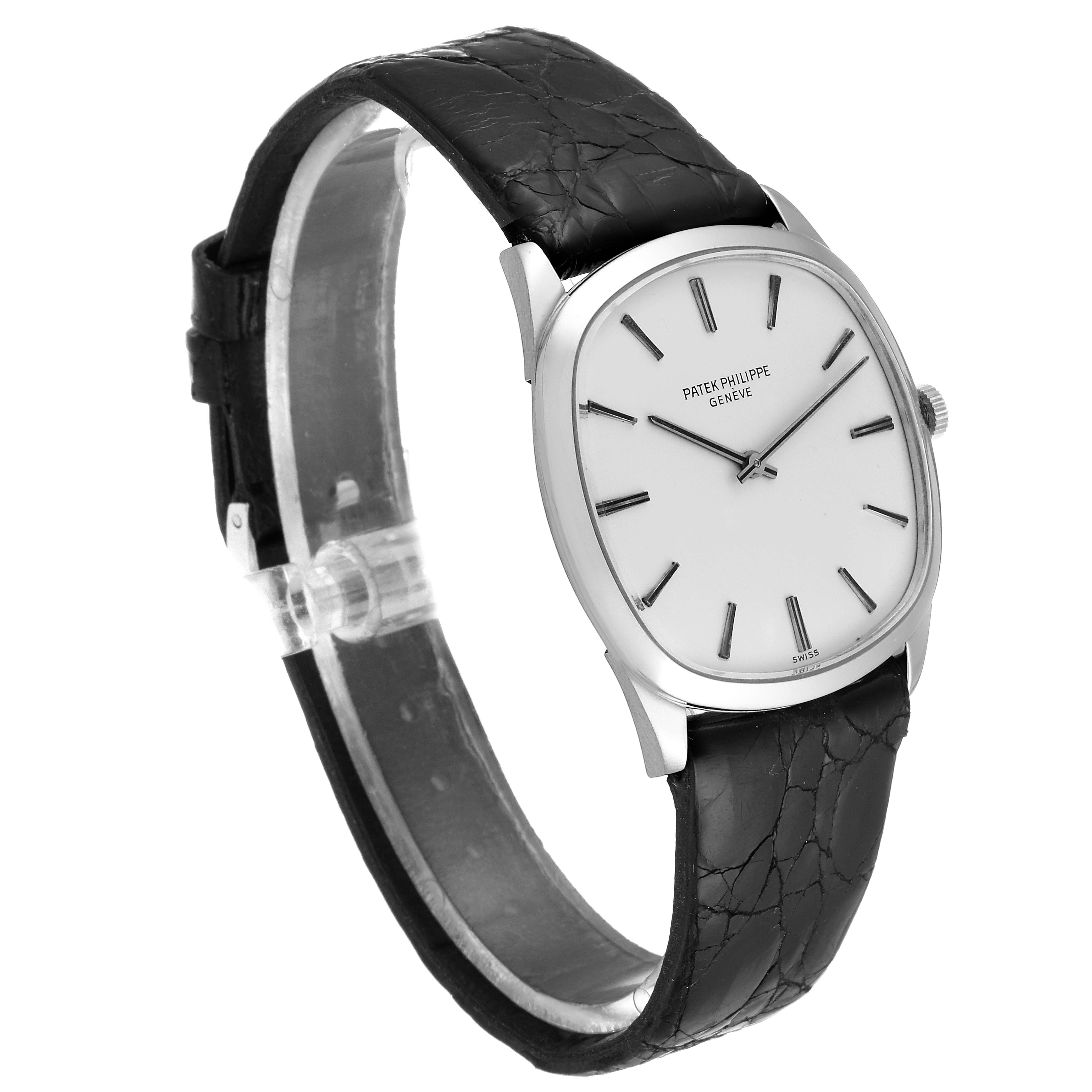 The image shows a side and front angle of the Patek Philippe Vintage 3544 Men's Stainless Steel Silver Dial 3544 Men's Stainless Steel Silver Dial model, displaying its round case, white dial, and leather strap.