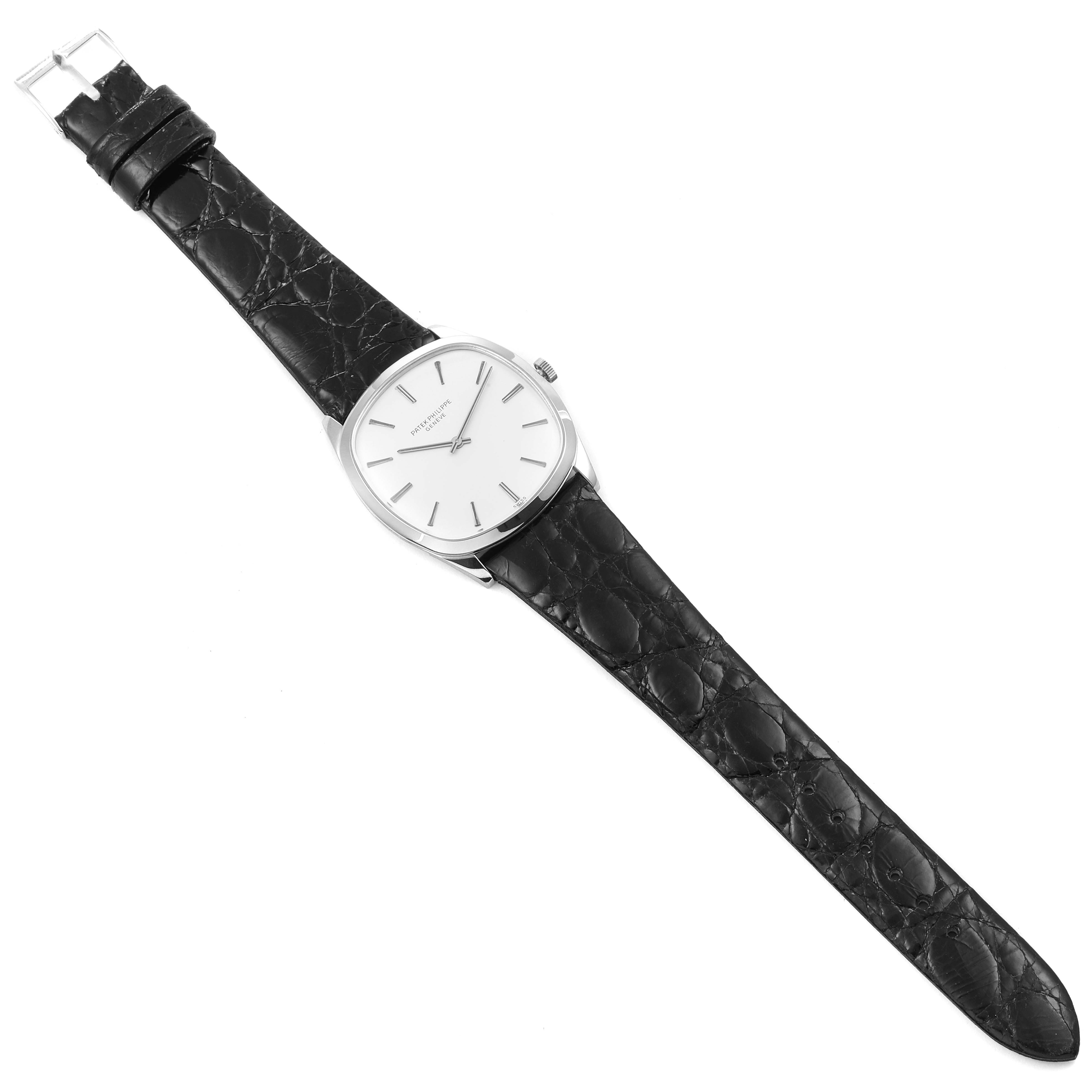 This image shows a full view of the face and strap of a vintage Patek Philippe watch, focusing on the front and top sides.