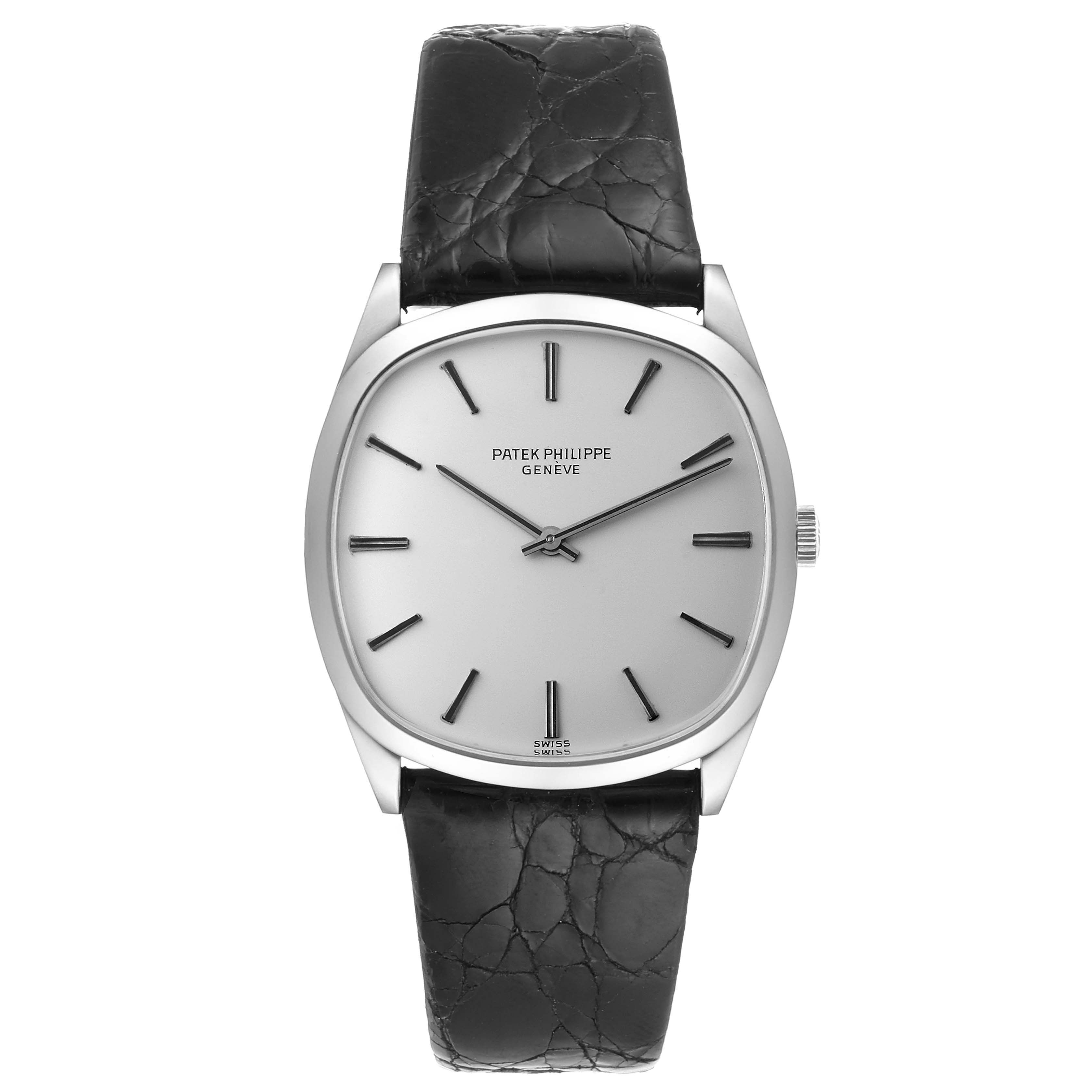 This image shows a front view of a Vintage Patek Philippe watch, highlighting the dial, hands, and strap.