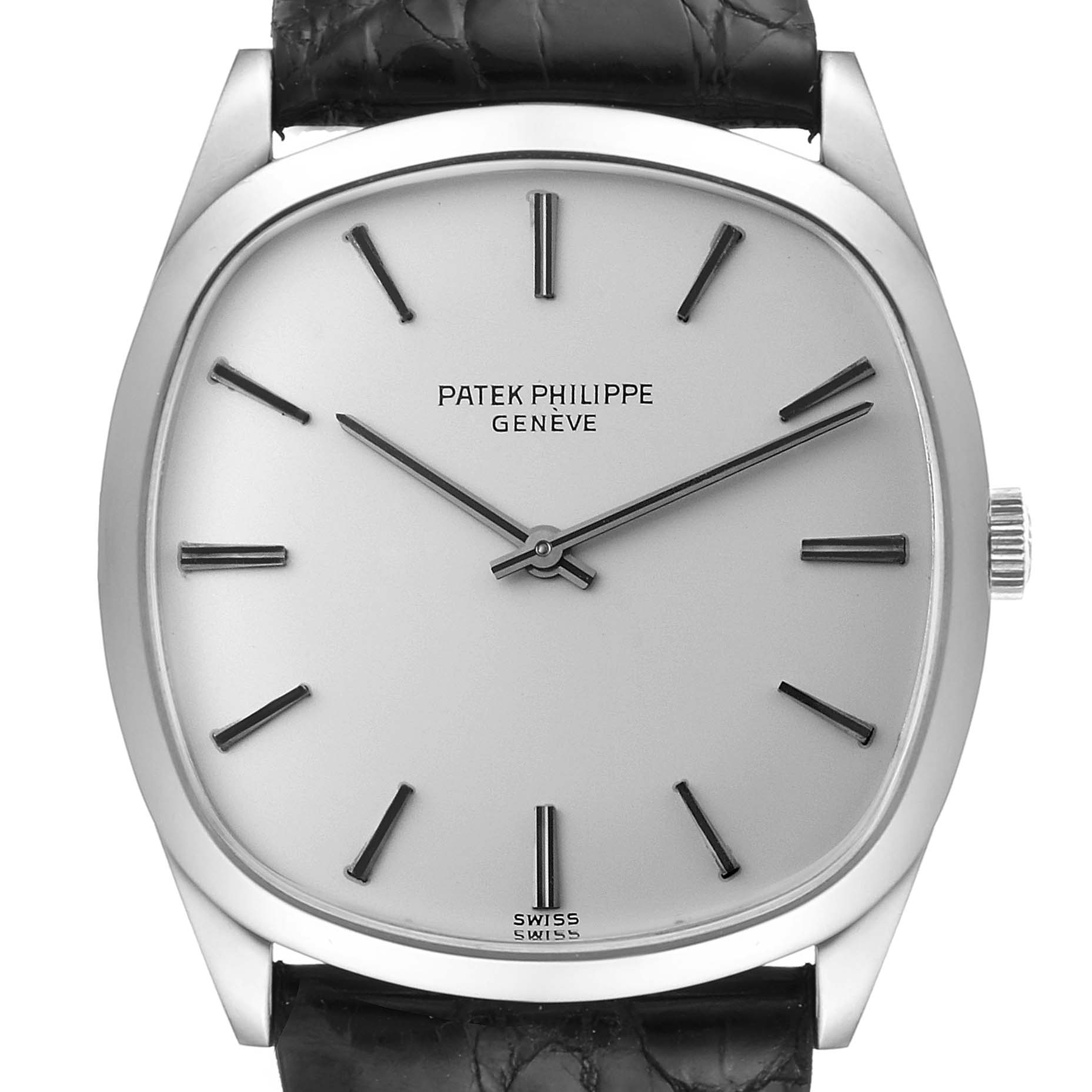 The image shows a front view of a Vintage Patek Philippe watch, highlighting the dial, hour markers, hands, and part of the strap.