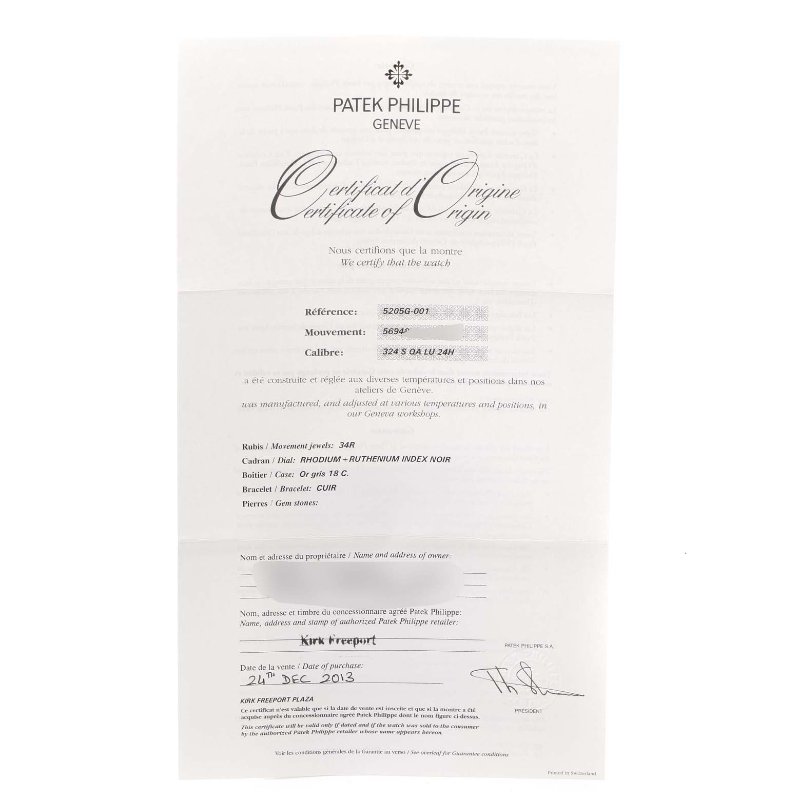 The image shows a Certificate of Origin for a Patek Philippe Complications 5205G  Men's White Gold Silver Dial 5205G  Men's White Gold Silver Dial watch, detailing the reference number, movement, caliber, and other specifications.