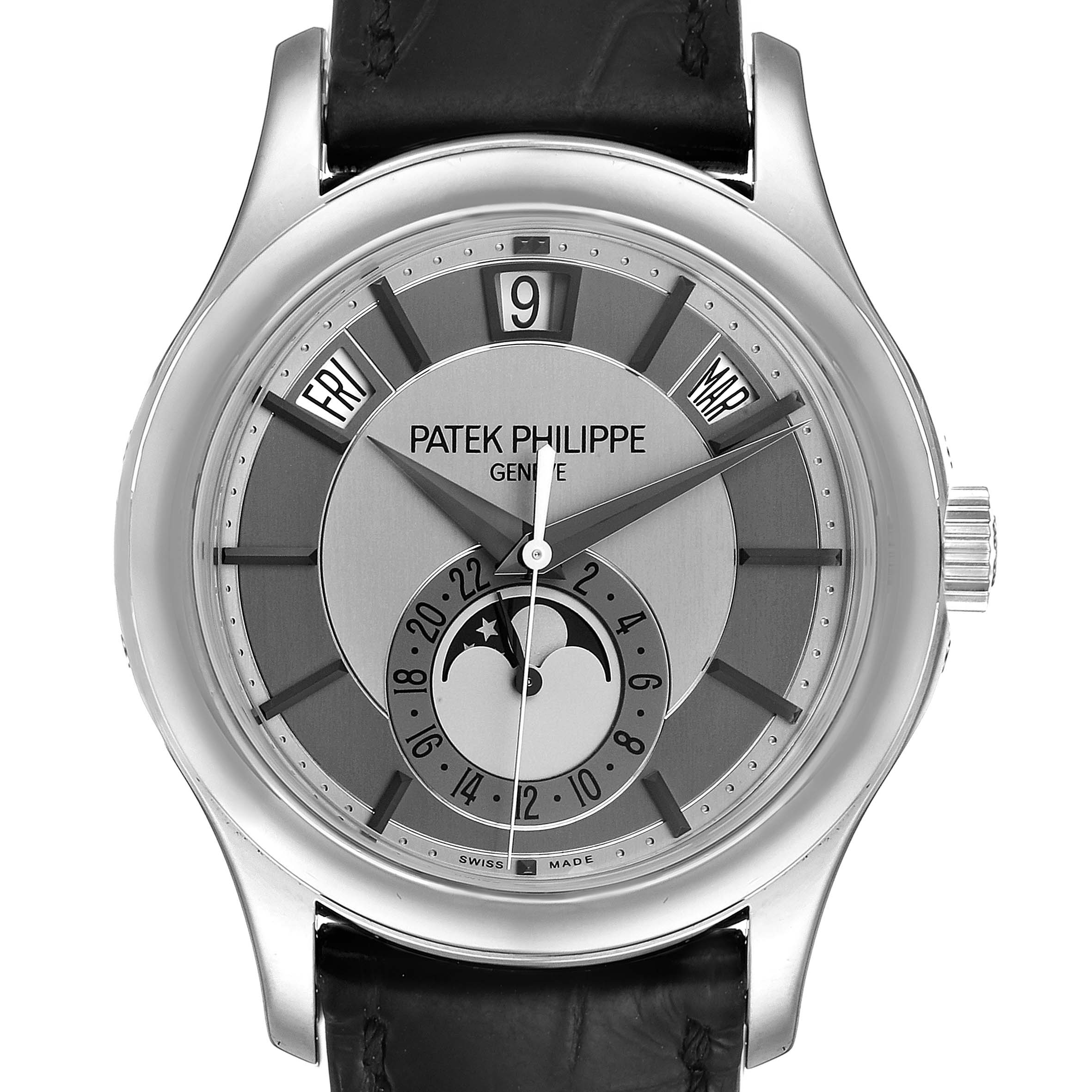 The image shows the front view of a Patek Philippe Complications 5205G  Men's White Gold Silver Dial 5205G  Men's White Gold Silver Dial watch, displaying the dial with day, date, and moon phase indicators.