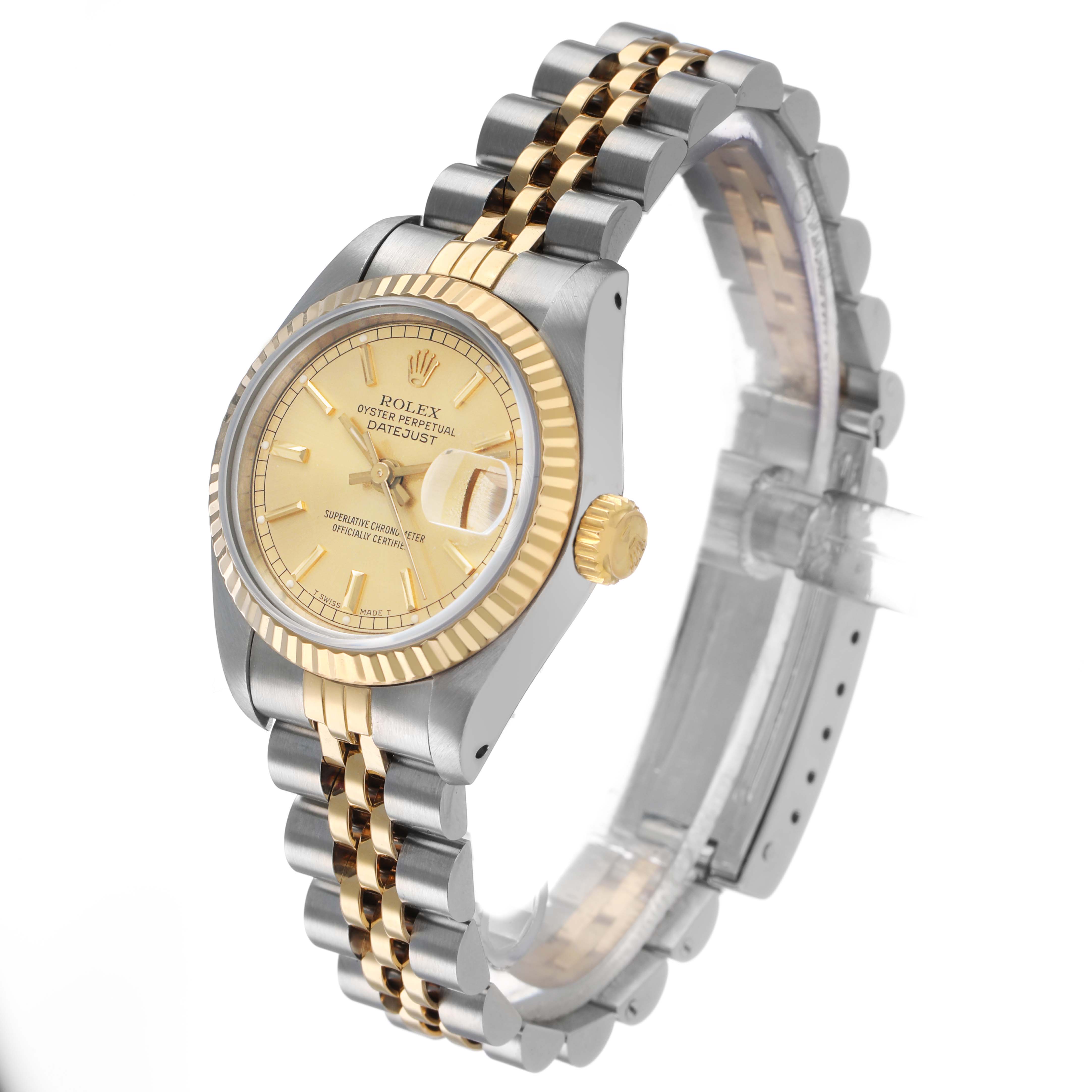 The Rolex Datejust 69173 Women's Stainless Steel Champagne Dial watch is shown at a slight angle displaying the face, two-tone bracelet, and fluted bezel.