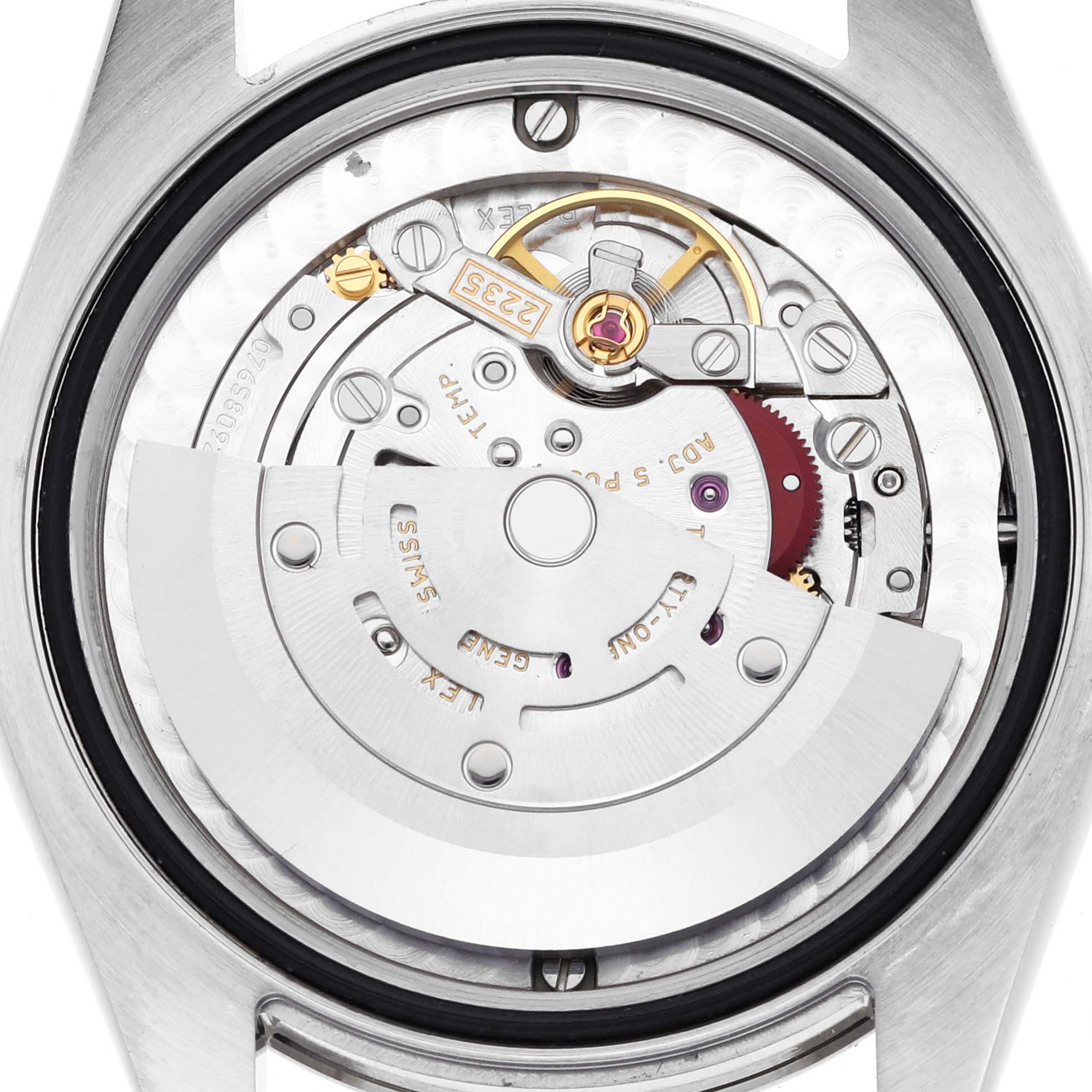 The image shows the movement mechanism of a Rolex Mid-Size 178274 Women's Stainless Steel Silver Dial 178274 Women's Stainless Steel Silver Dial model, viewed from the back with visible gears and rotor.