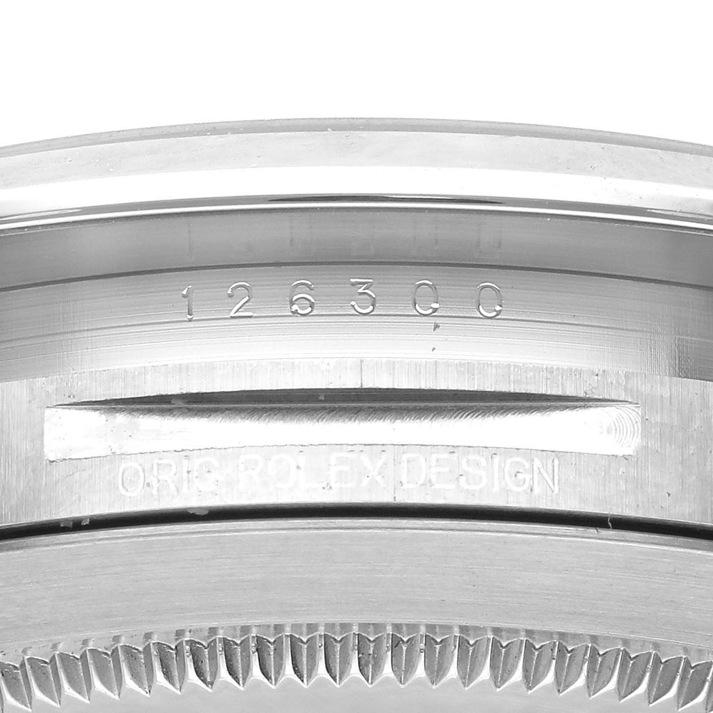 The image shows a close-up of the side of the bezel and casing with the engraved model number of the Rolex Datejust 41 126300 Men
s Stainless Steel Blue Dial 126300 Men
s Stainless Steel Blue Dial.