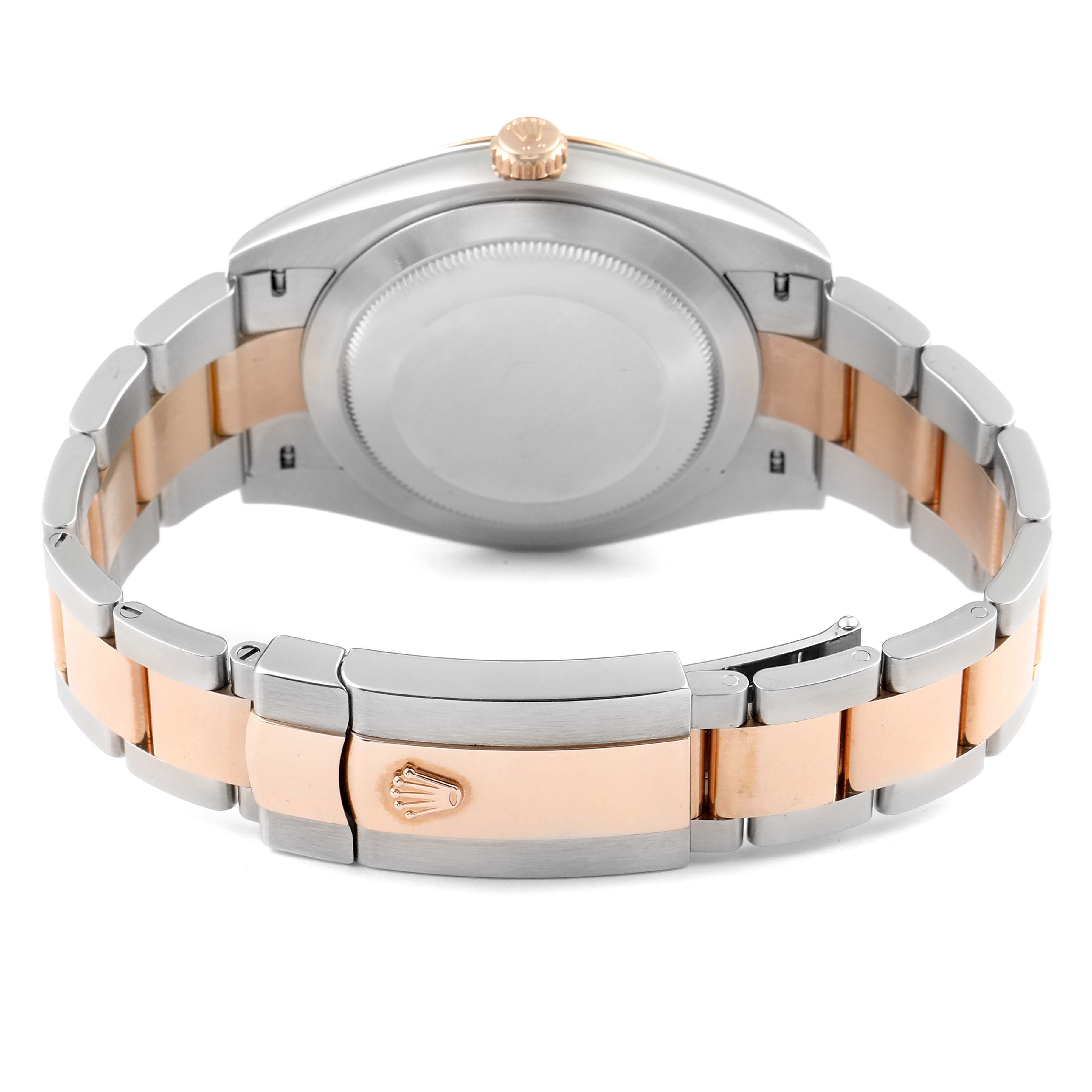 The image shows the back casing and bracelet of a Rolex Datejust 41 126331 Men's Steel and Gold (two tone) Beige Dial 126331 Men's Steel and Gold (two tone) Beige Dial, featuring a two-tone metal design and the clasp with the Rolex logo.