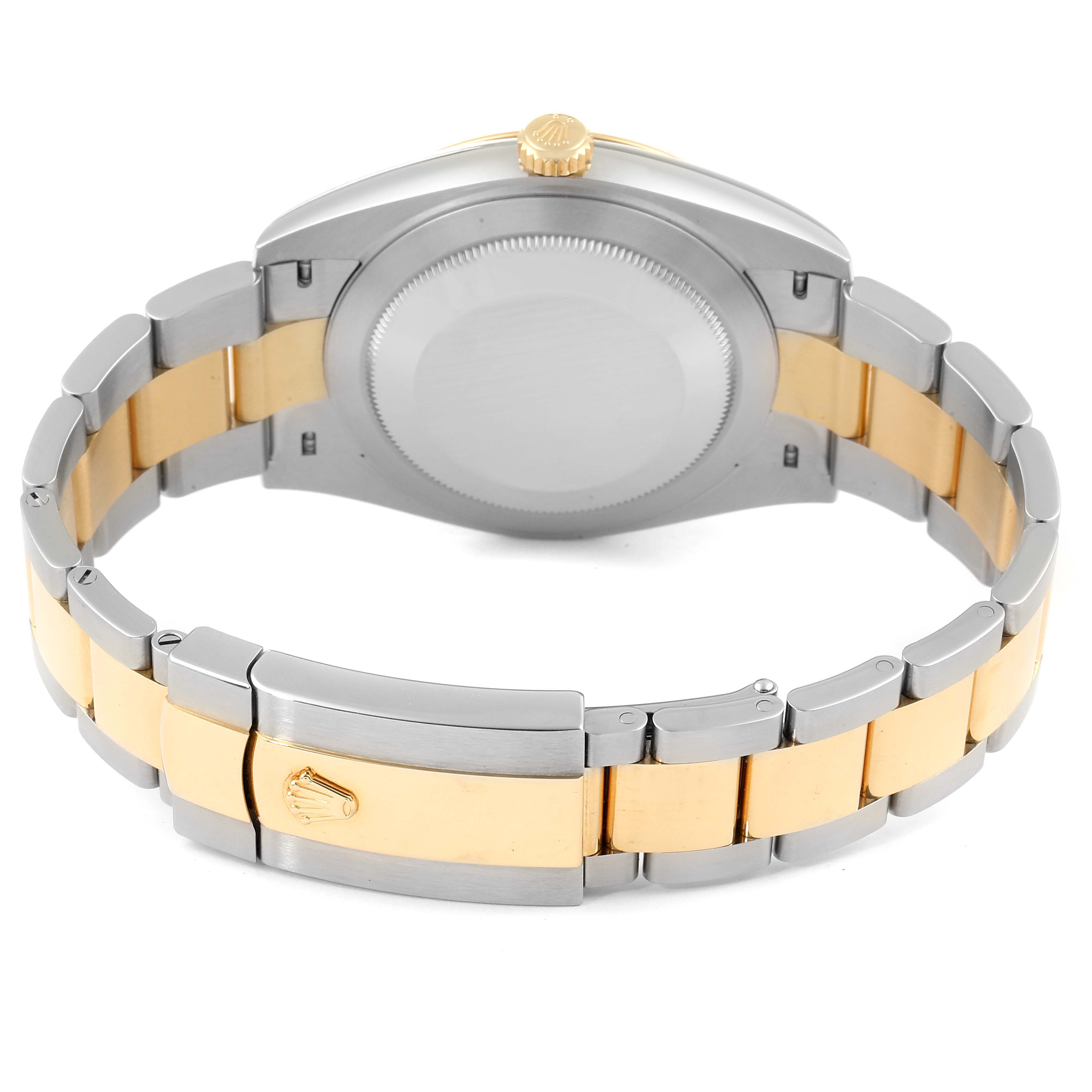 This image shows the case back, crown, and bracelet of the Rolex Datejust 41 126303 Men's Steel and Gold (two tone) Champagne Dial 126303 Men's Steel and Gold (two tone) Champagne Dial model at an angle capturing the rear of the watch.