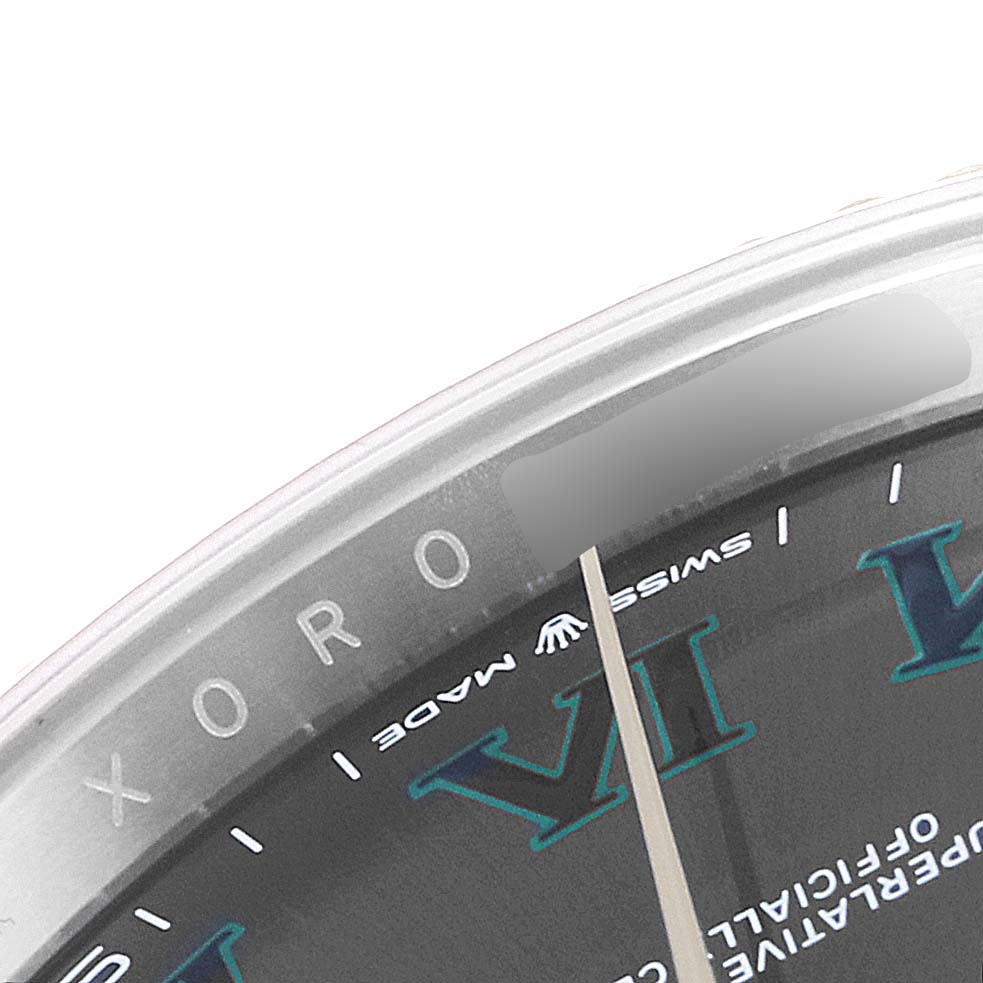 The image shows a close-up of the dial and bezel of a Rolex Datejust 41 126333 Men's Steel and Gold (two tone) Grey Dial 126333 Men's Steel and Gold (two tone) Grey Dial, highlighting the "Swiss Made" text and part of the Roman numeral "VI."