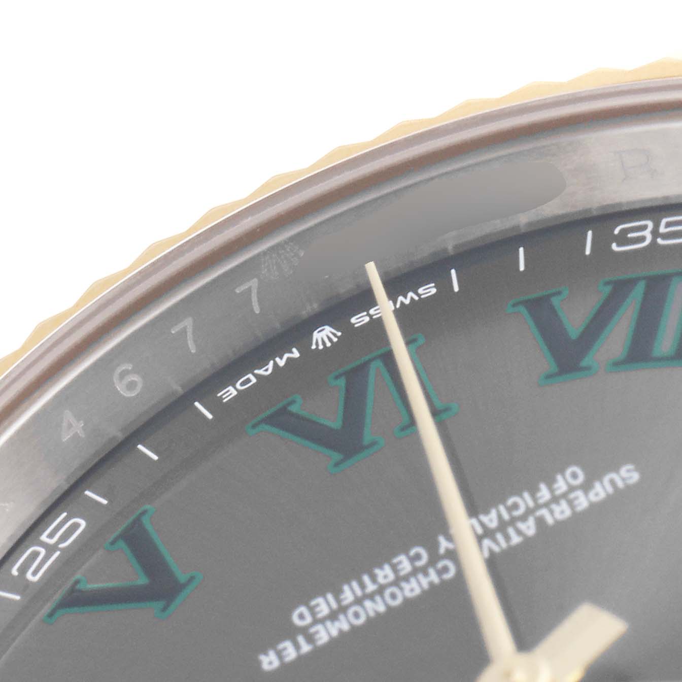 The image shows a close-up view of the dial and bezel of a Rolex Datejust 41 126333 Men
s Steel and Gold (two tone) Grey Dial 126333 Men
s Steel and Gold (two tone) Grey Dial watch, focusing on the Roman numeral "VI" and adjacent markers.