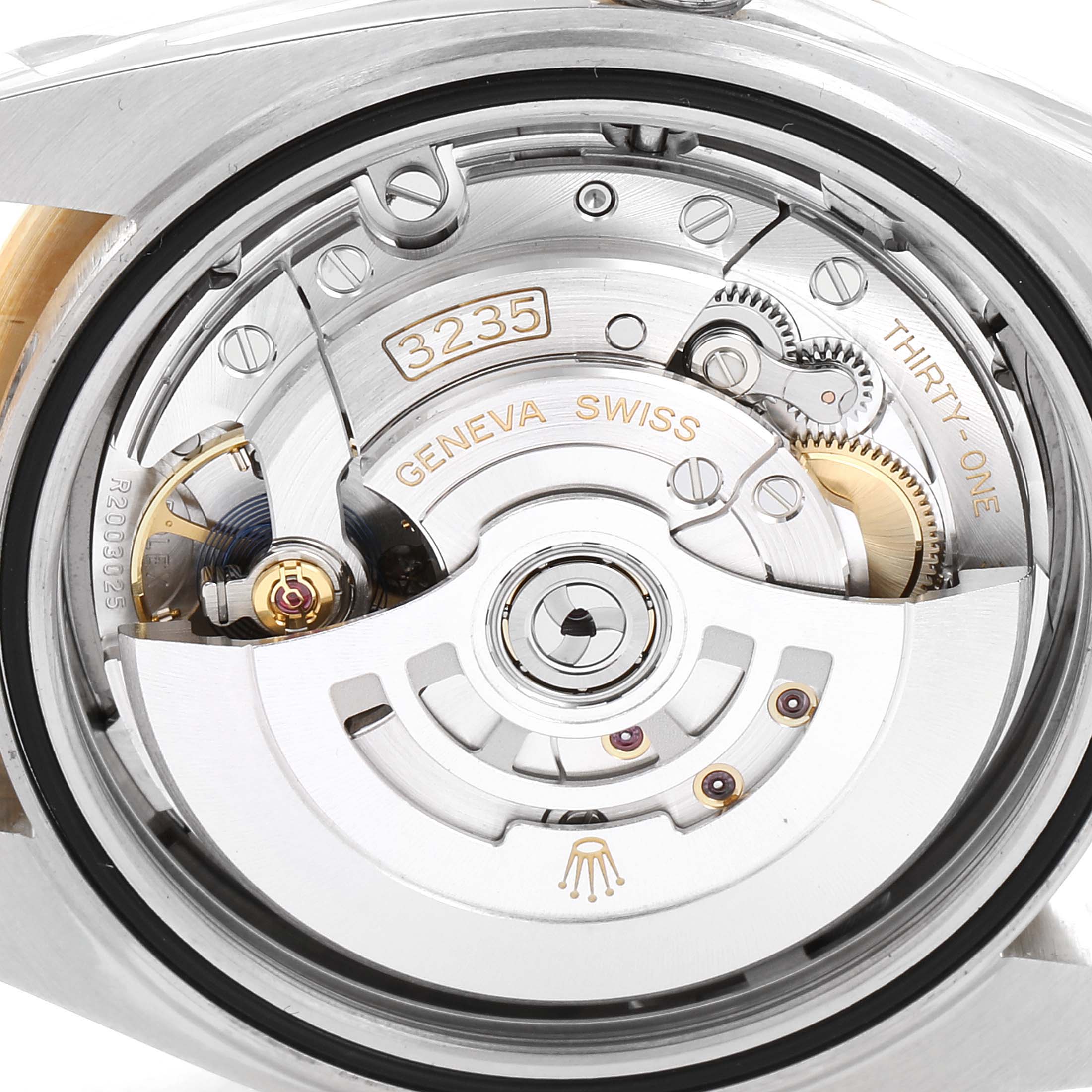 This image shows the intricate internal mechanics of the Rolex Datejust 41 126333 Men
s Steel and Gold (two tone) Grey Dial 126333 Men
s Steel and Gold (two tone) Grey Dial watch, viewed from the back.