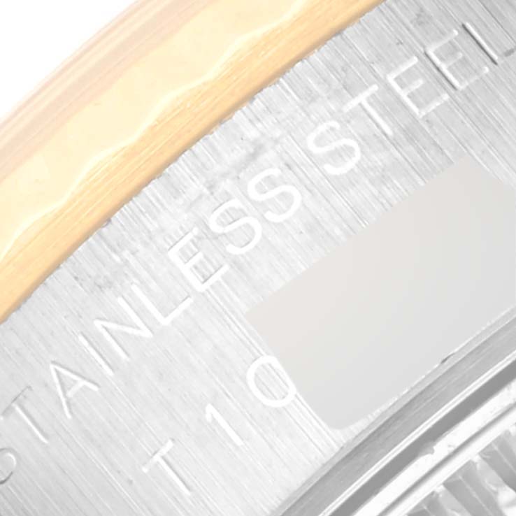 The image shows a close-up of the case back edge text of a Rolex Datejust 69173 Women's Steel and Gold (two tone) Champagne Dial 69173 Women's Steel and Gold (two tone) Champagne Dial watch.