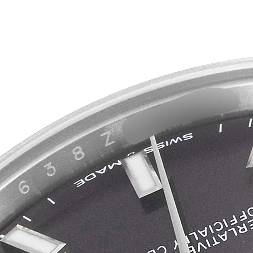 This image shows a close-up of the dial on a Rolex Mid-Size 278274 Women's Stainless Steel Grey Dial 278274 Women's Stainless Steel Grey Dial model, featuring the hour markers, minute hand, and part of the bezel.