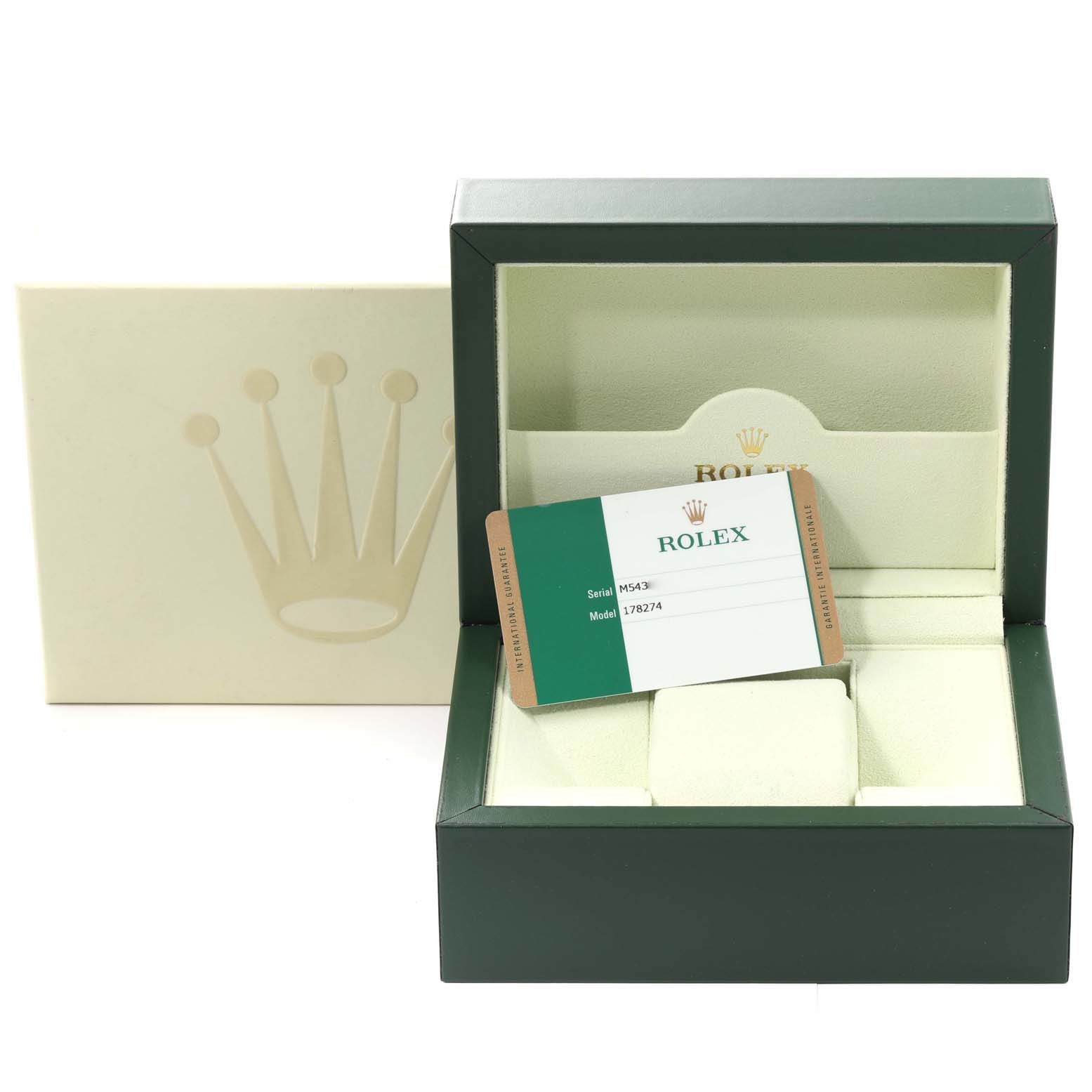 The image shows the open box, warranty card, and outer packaging of a Mid-Size model Rolex watch.