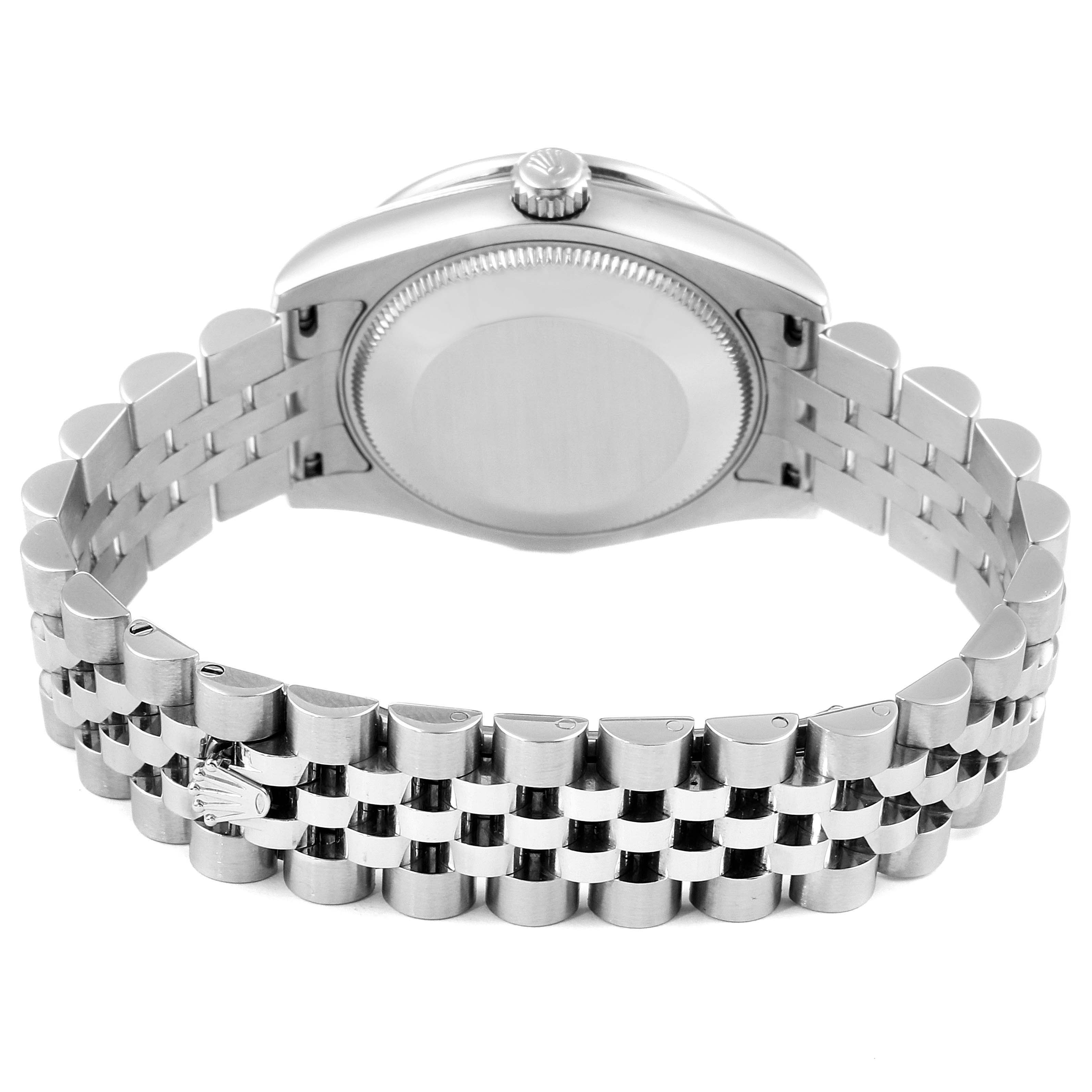 The image shows the back view of a Rolex Mid-Size 178384 Women
s Stainless Steel Mother of Pearl Dial 178384 Women
s Stainless Steel Mother of Pearl Dial model watch, highlighting the case back and bracelet.