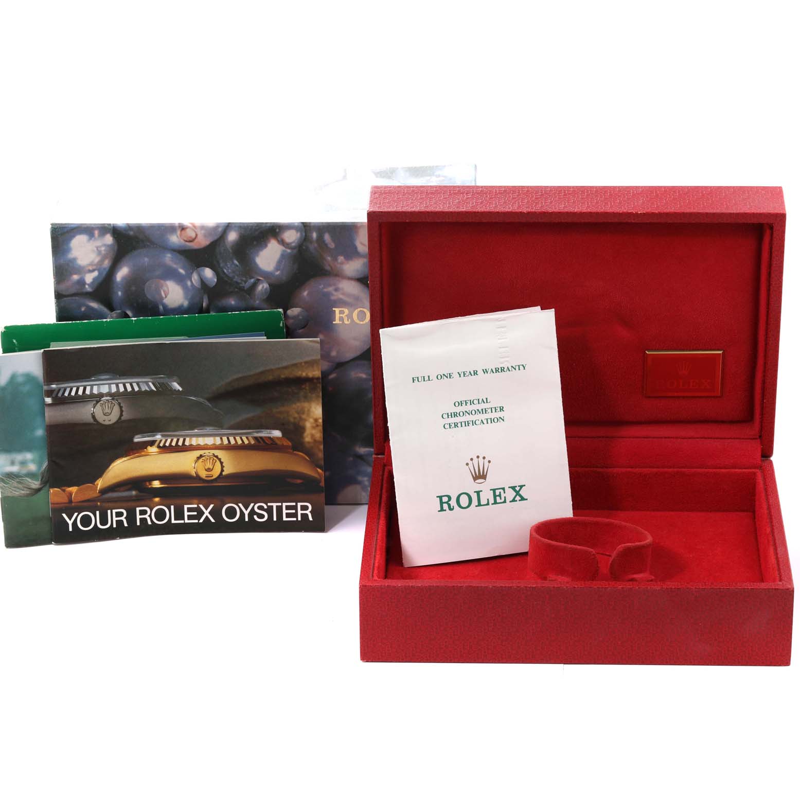 The image shows the accessories for a Rolex President 69138 Women's Yellow Gold Black Dial 69138 Women's Yellow Gold Black Dial watch, including the watch box, warranty card, and manuals.