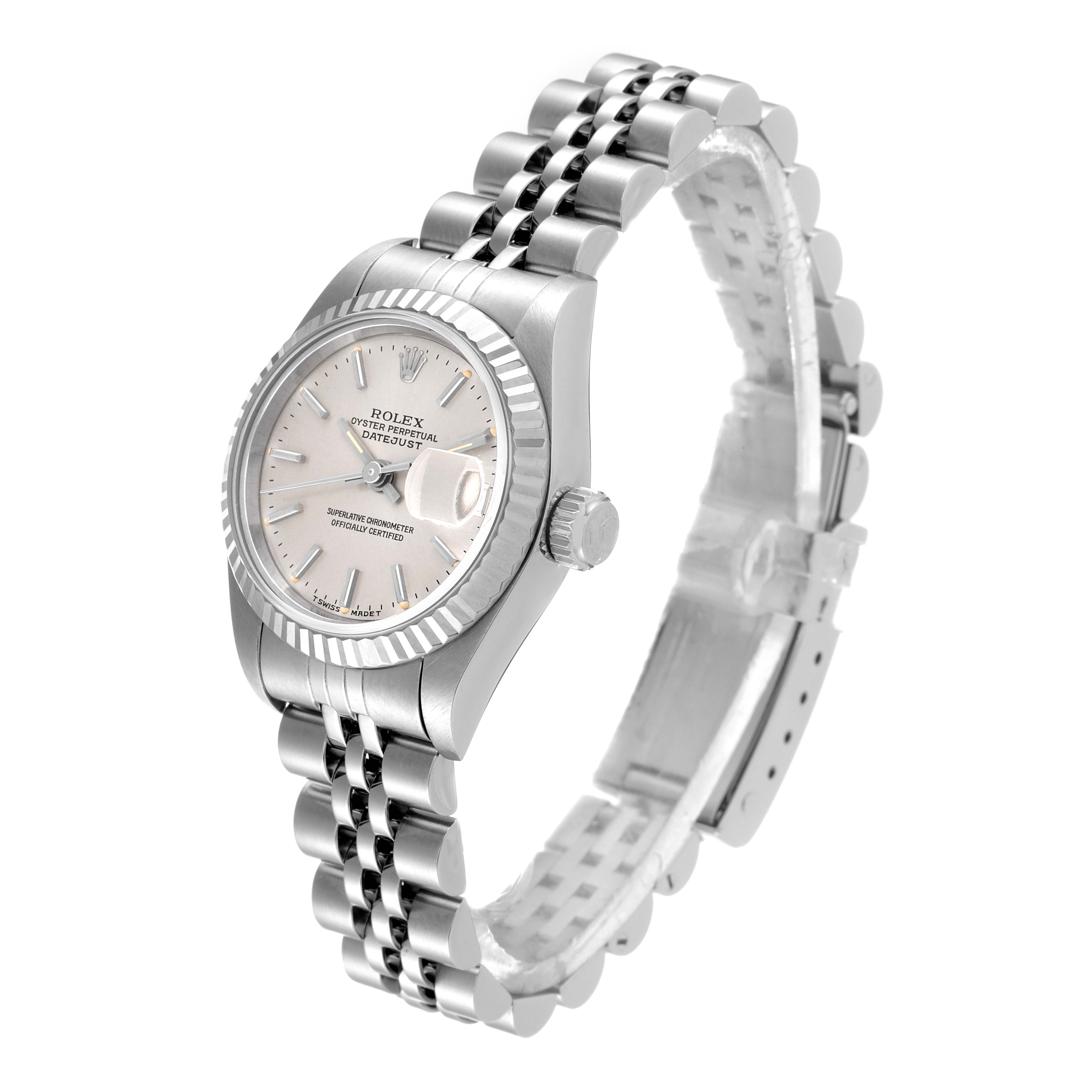 The image shows a Rolex Datejust 69174 Women
s Stainless Steel Silver Dial 69174 Women
s Stainless Steel Silver Dial watch from a three-quarter angle, displaying the face, bezel, crown, and part of the bracelet.