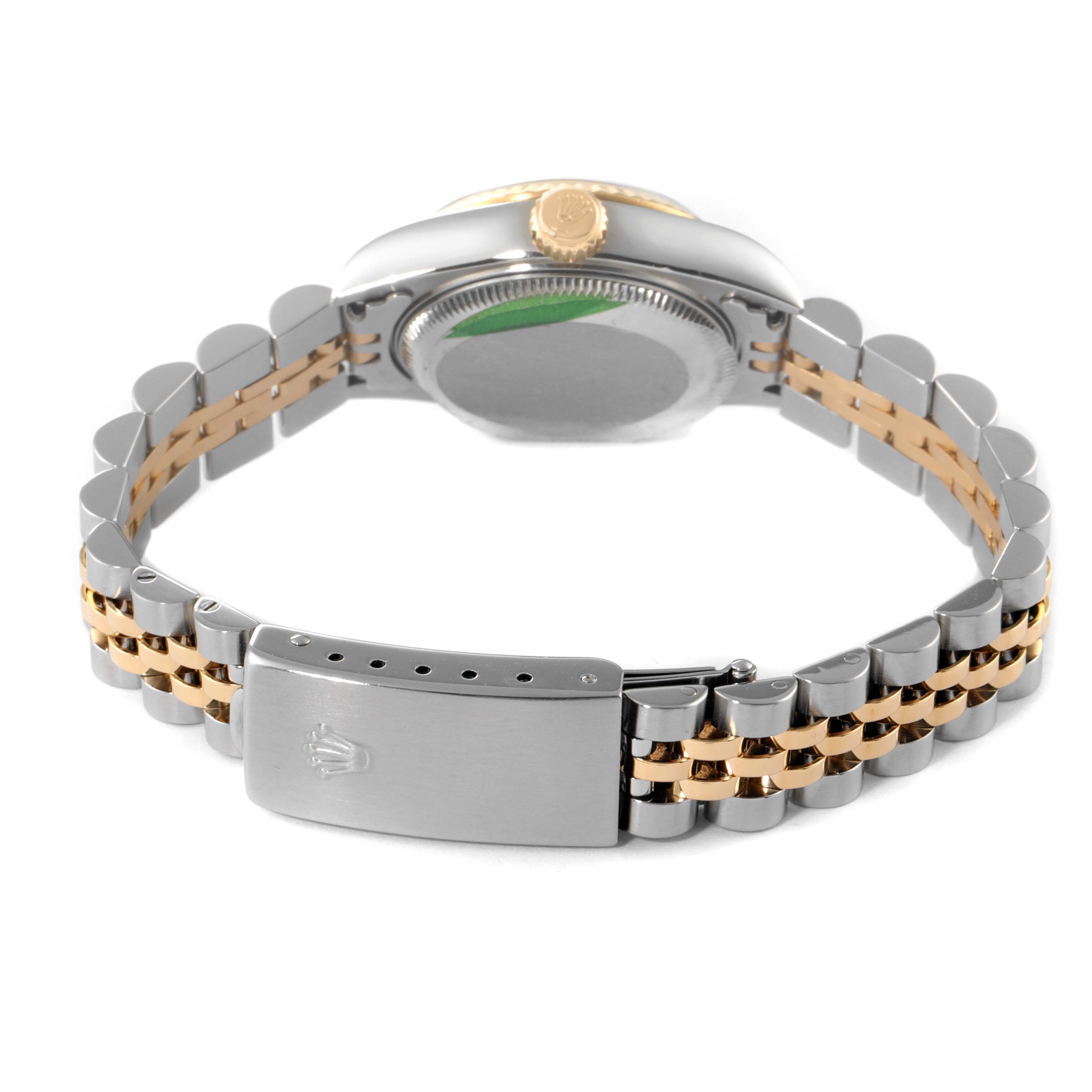 The image shows the backside of a Rolex Datejust 79173 Women
s Steel and Gold (two tone) Champagne Dial 79173 Women
s Steel and Gold (two tone) Champagne Dial watch, focusing on its clasp, bracelet, and case back.