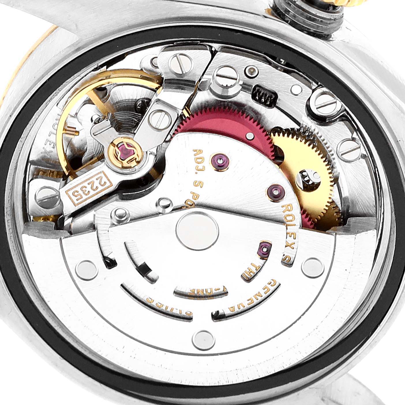 The image shows a close-up view of the internal movement mechanism of a Rolex Datejust 79173 Women
s Steel and Gold (two tone) Champagne Dial 79173 Women
s Steel and Gold (two tone) Champagne Dial watch.