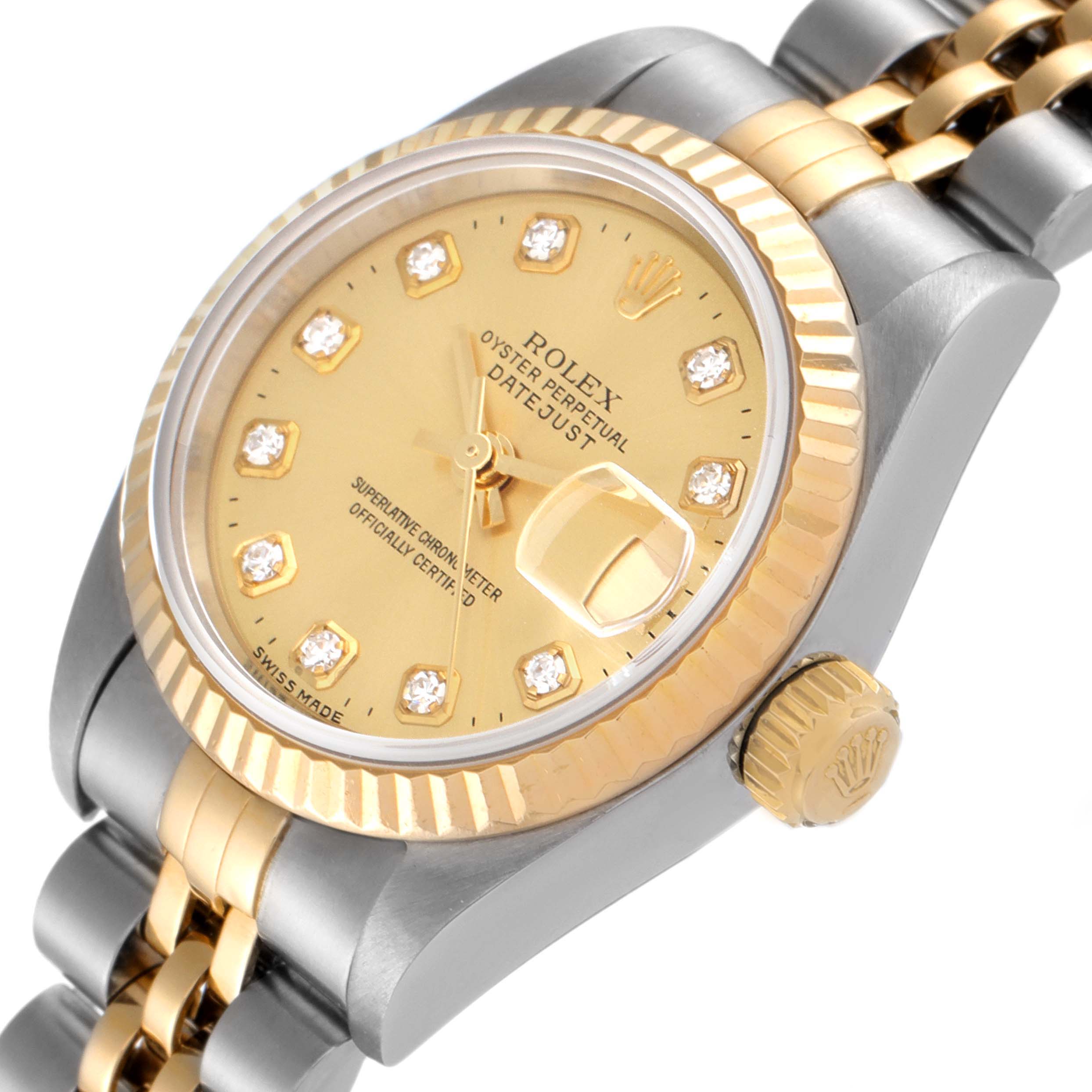 The image shows a close-up angled view of the Rolex Datejust 79173 Women
s Steel and Gold (two tone) Champagne Dial 79173 Women
s Steel and Gold (two tone) Champagne Dial, highlighting the dial, bezel, crown, and part of the bracelet.