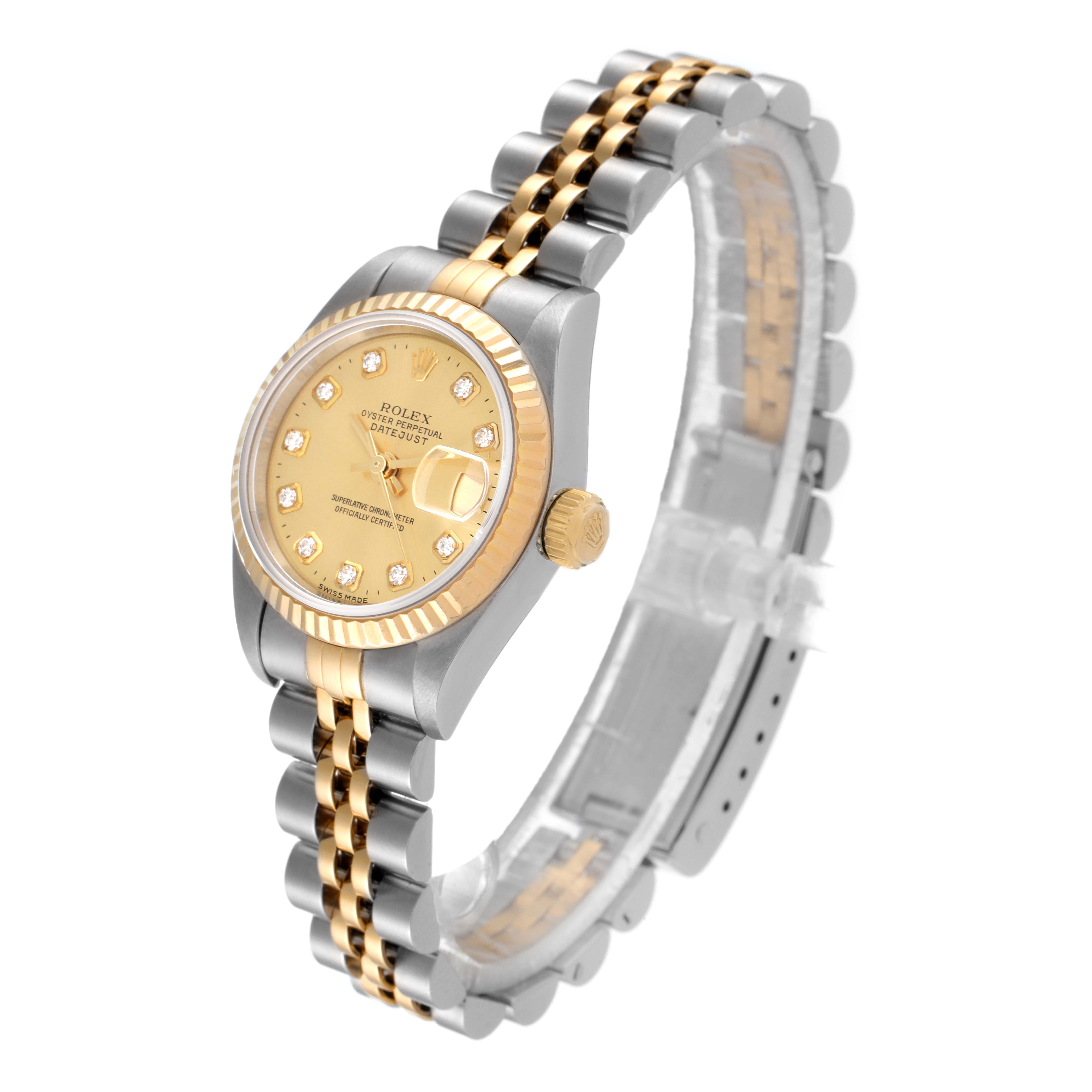The image shows a Rolex Datejust 79173 Women
s Steel and Gold (two tone) Champagne Dial 79173 Women
s Steel and Gold (two tone) Champagne Dial watch at a side angle, highlighting its two-tone metal bracelet, crown, and gold dial.