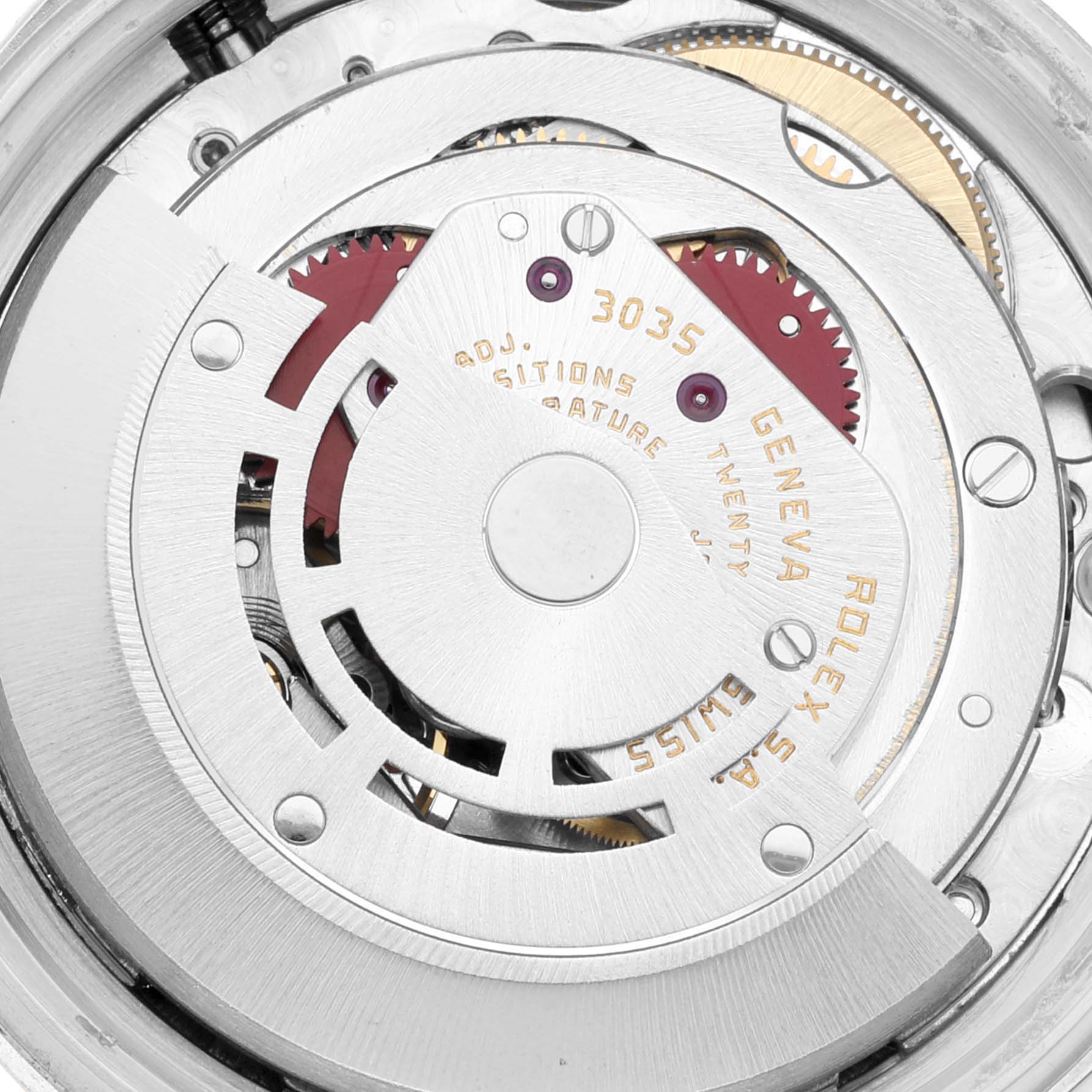 The image shows the movement of a Rolex Datejust 16013 Men's Steel and Gold (two tone) White Dial 16013 Men's Steel and Gold (two tone) White Dial, focusing on the rotor and intricate mechanical parts.