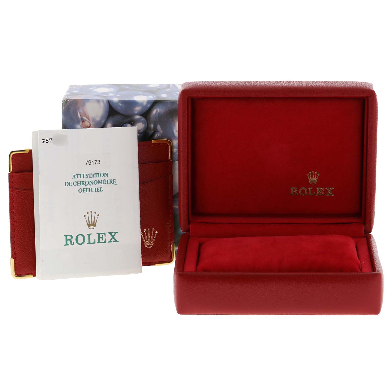The image shows a red Rolex Datejust 79173 Women
s Steel and Gold (two tone) White Dial 79173 Women
s Steel and Gold (two tone) White Dial watch box, certificate, and booklets from a front angle.