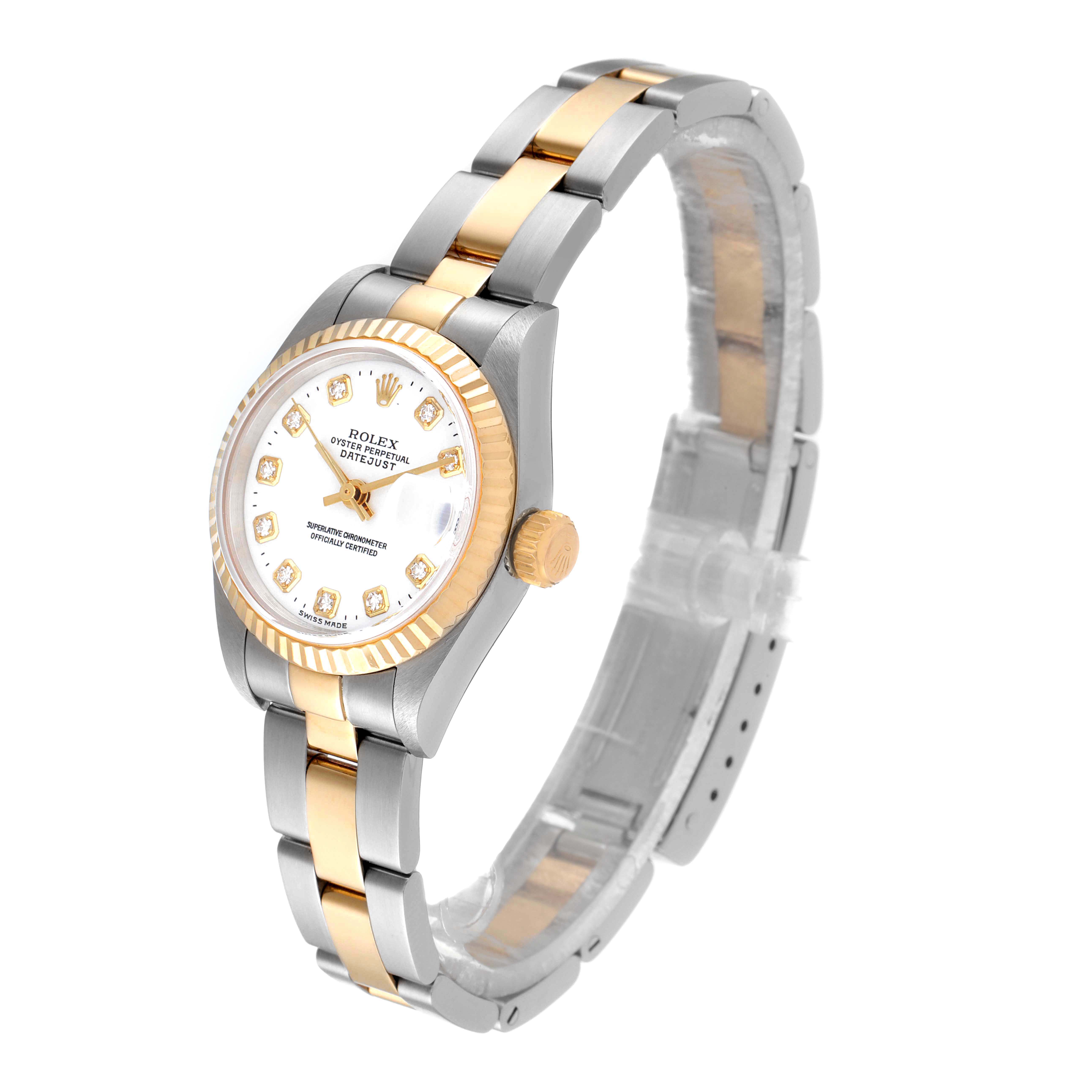 The image shows a Rolex Datejust 79173 Women
s Steel and Gold (two tone) White Dial 79173 Women
s Steel and Gold (two tone) White Dial watch at an angled view, highlighting the dial, bezel, crown, and metal bracelet.