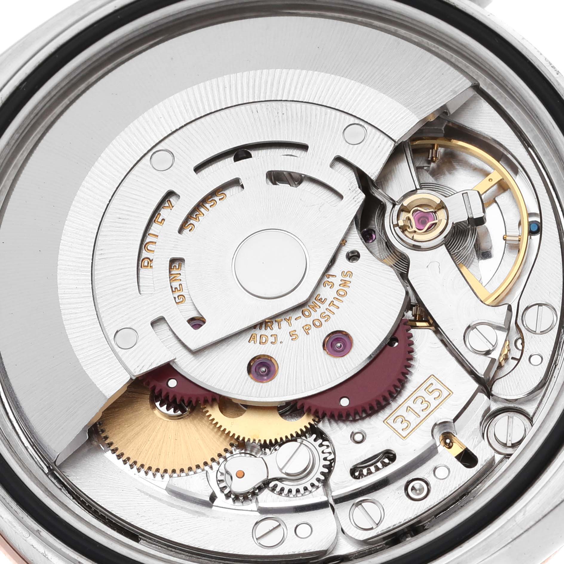 This image shows the movement mechanism of a Rolex Turn-o-Graph 116261 Men's Steel and Gold (two tone) Black Dial 116261 Men's Steel and Gold (two tone) Black Dial, highlighting its intricate internal components.