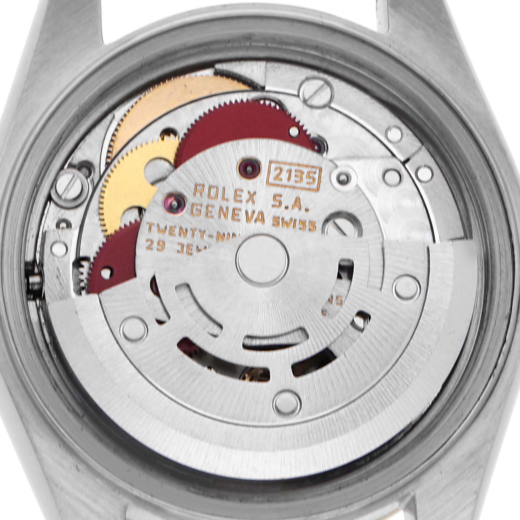 The image shows the movement of a Rolex Datejust 69173 Women's Steel and Gold (two tone) White Dial 69173 Women's Steel and Gold (two tone) White Dial watch from the back, highlighting the rotor and gears.