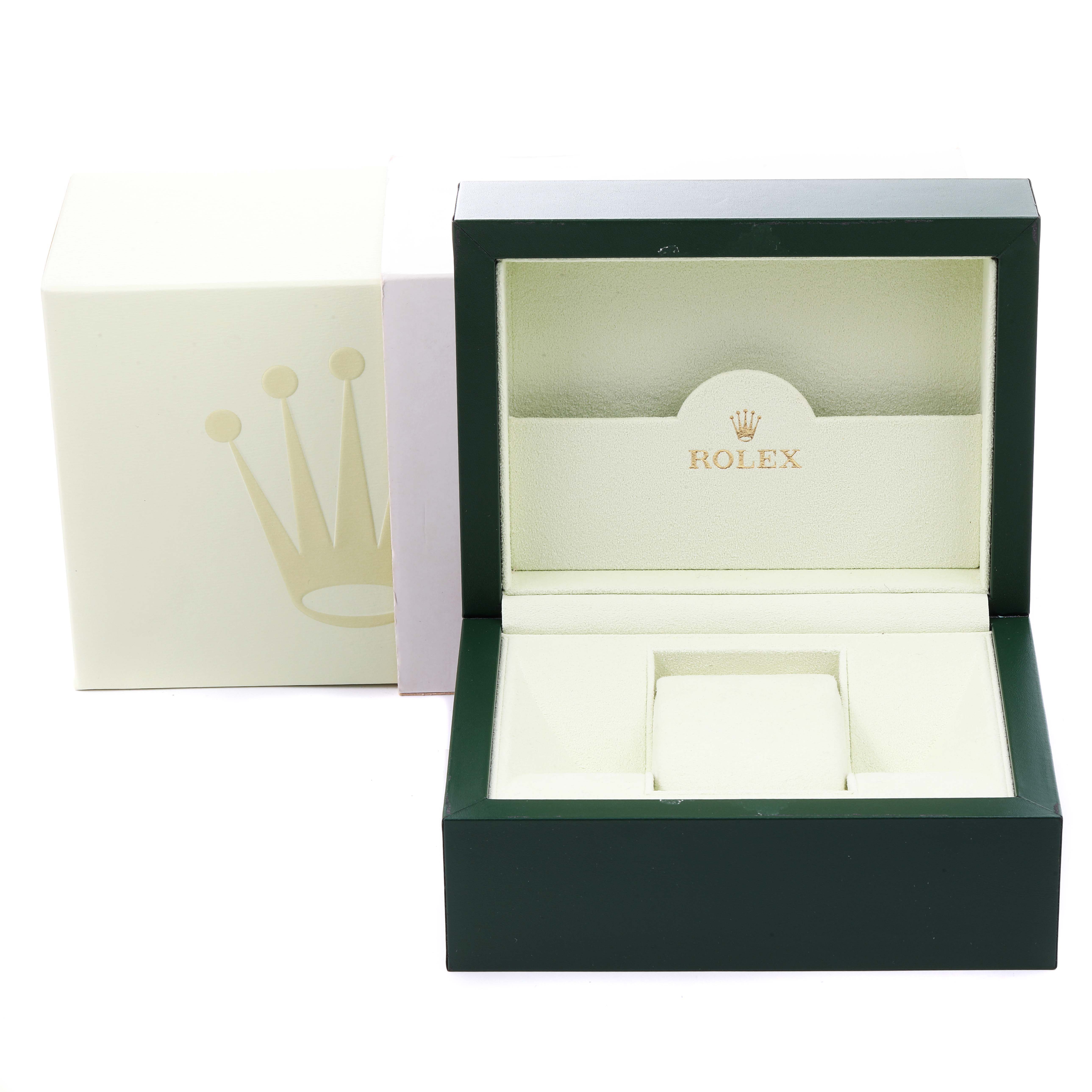 The image shows an open Rolex watch box for the Explorer model, displaying its interior and the outer packaging.