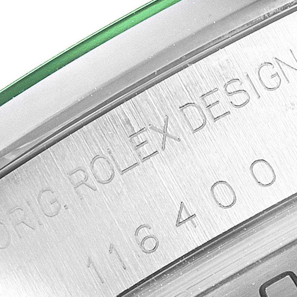 The image shows a close-up of the model number and part of the case from a Rolex Milgauss 116400GV Men
s Stainless Steel Blue Dial 116400GV Men
s Stainless Steel Blue Dial watch.