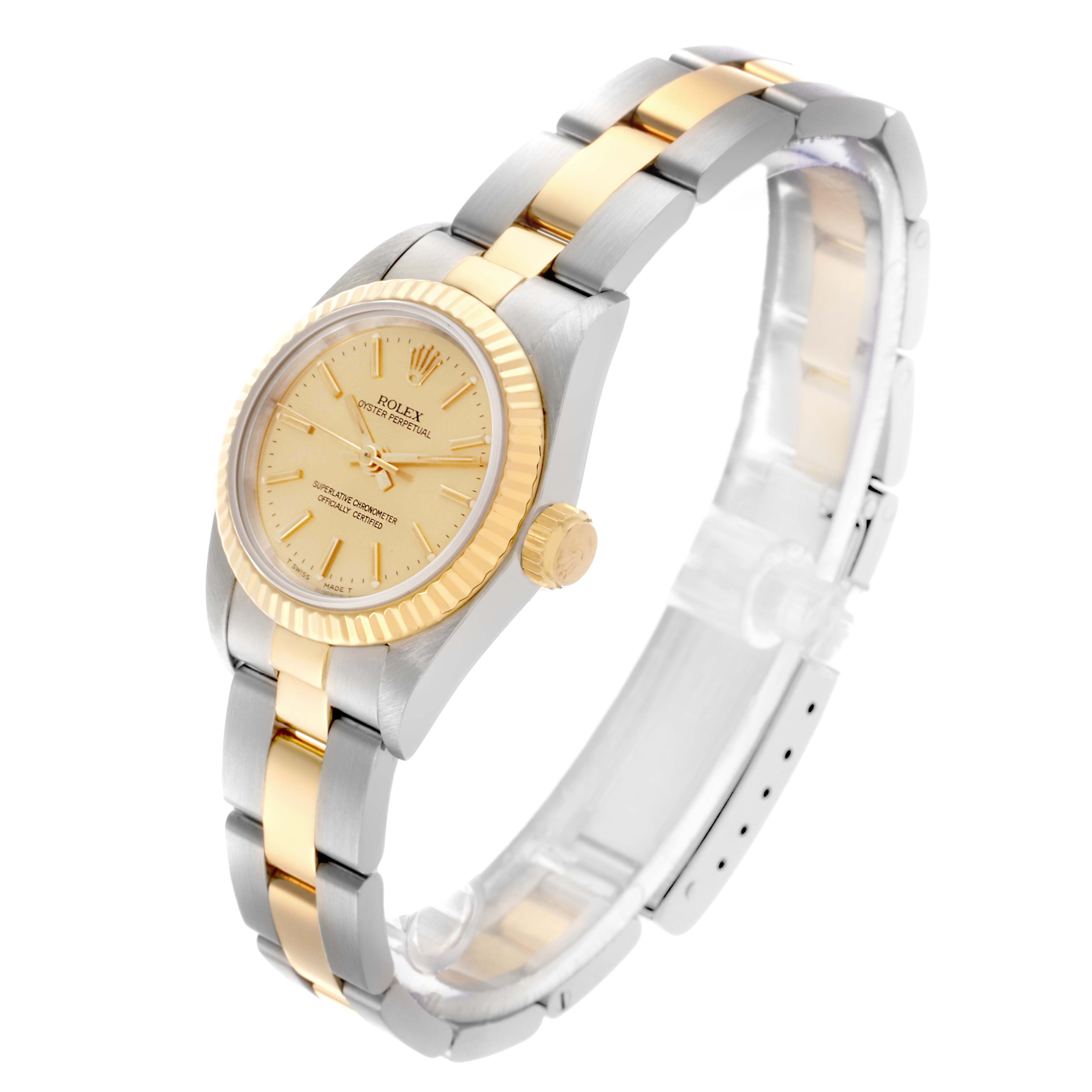 The Rolex Oyster Perpetual 67193 Women's Steel and Gold (two tone) Champagne Dial 67193 Women's Steel and Gold (two tone) Champagne Dial watch is shown at a three-quarter angle, highlighting the face, bezel, crown, and bracelet.