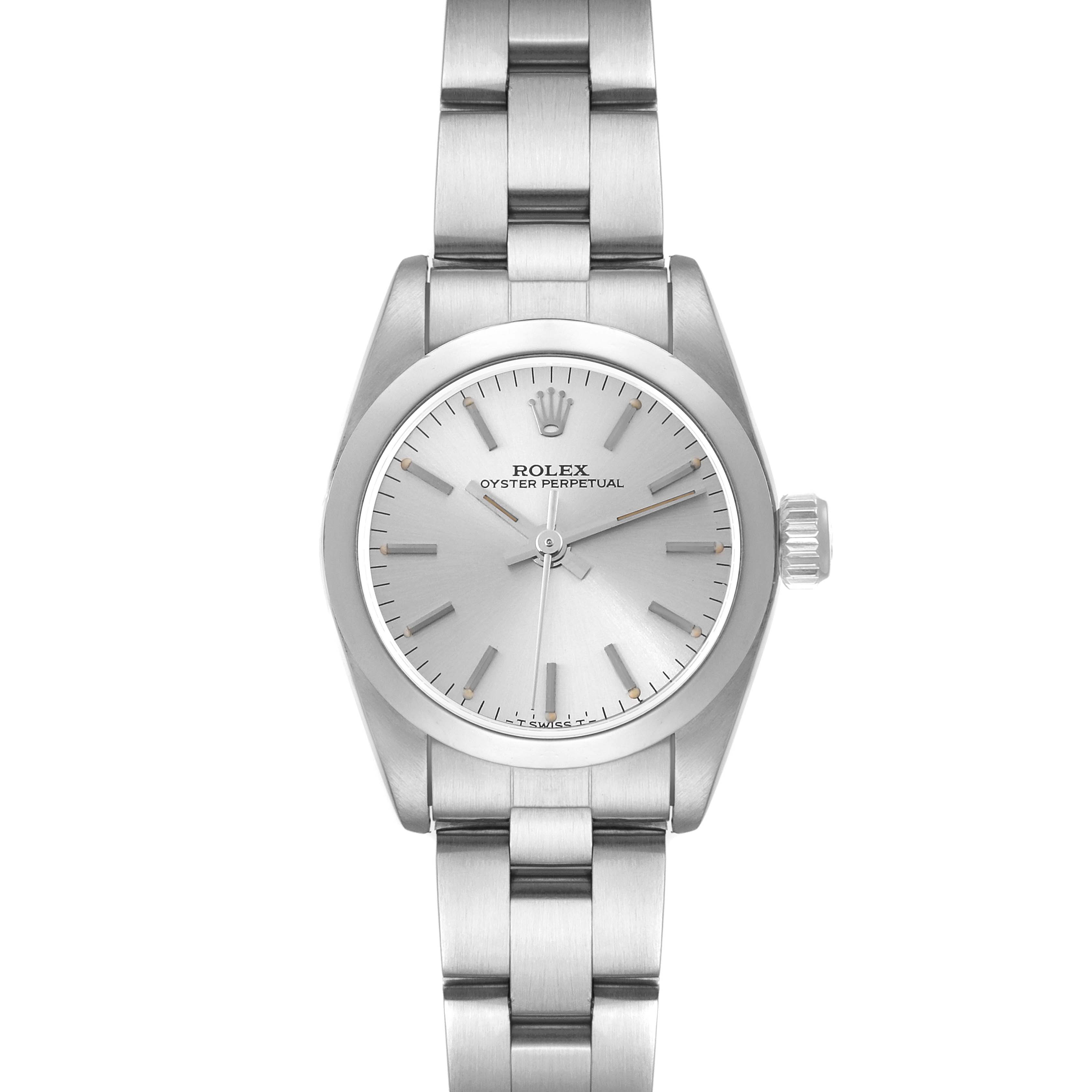 The image shows a front view of a Rolex Oyster Perpetual 67180 Women's Stainless Steel Silver Dial 67180 Women's Stainless Steel Silver Dial watch, featuring its silver dial, crown, and stainless steel bracelet.