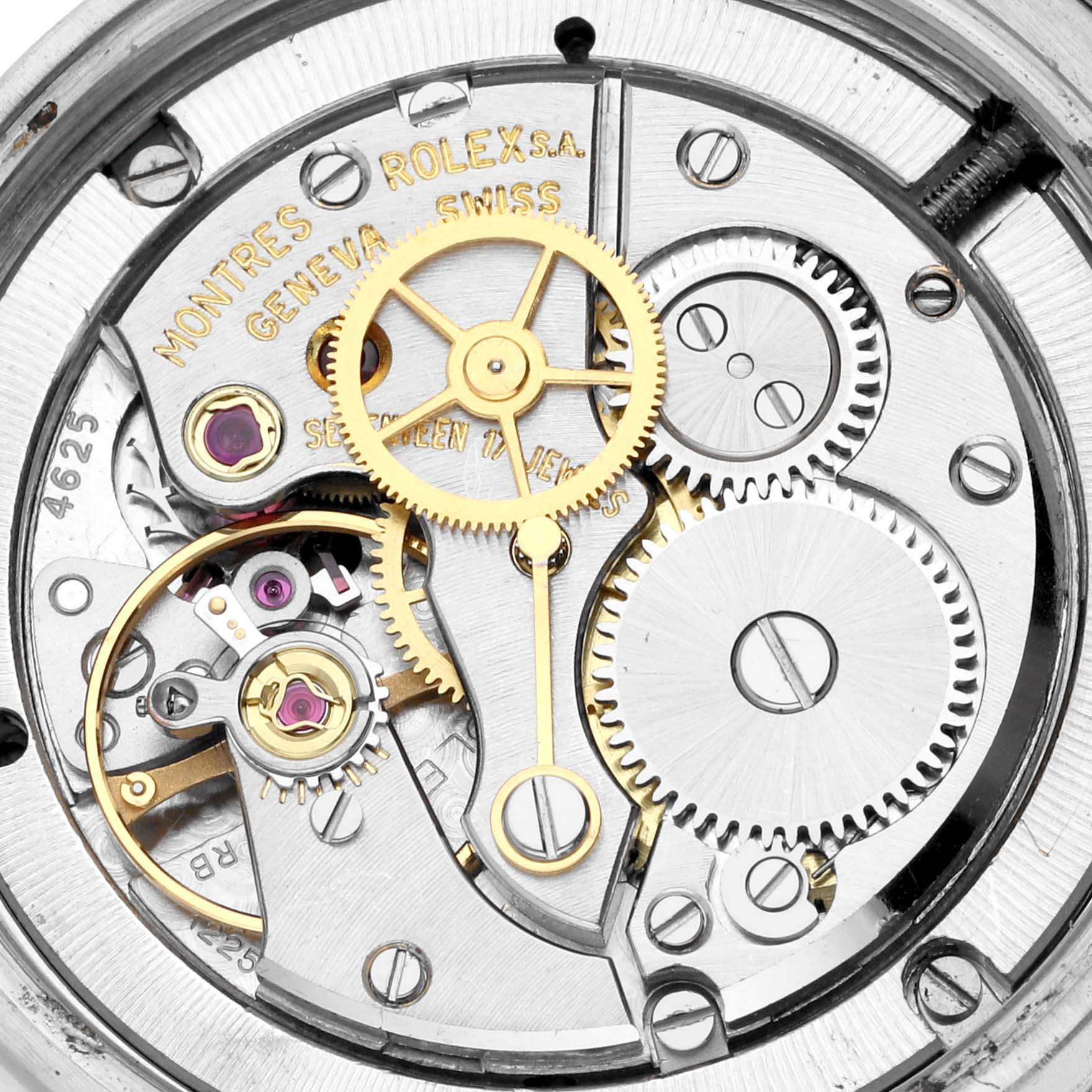This is an image of the internal mechanism (movement) of the Vintage Collection model by Rolex, showing gears and other intricate parts.