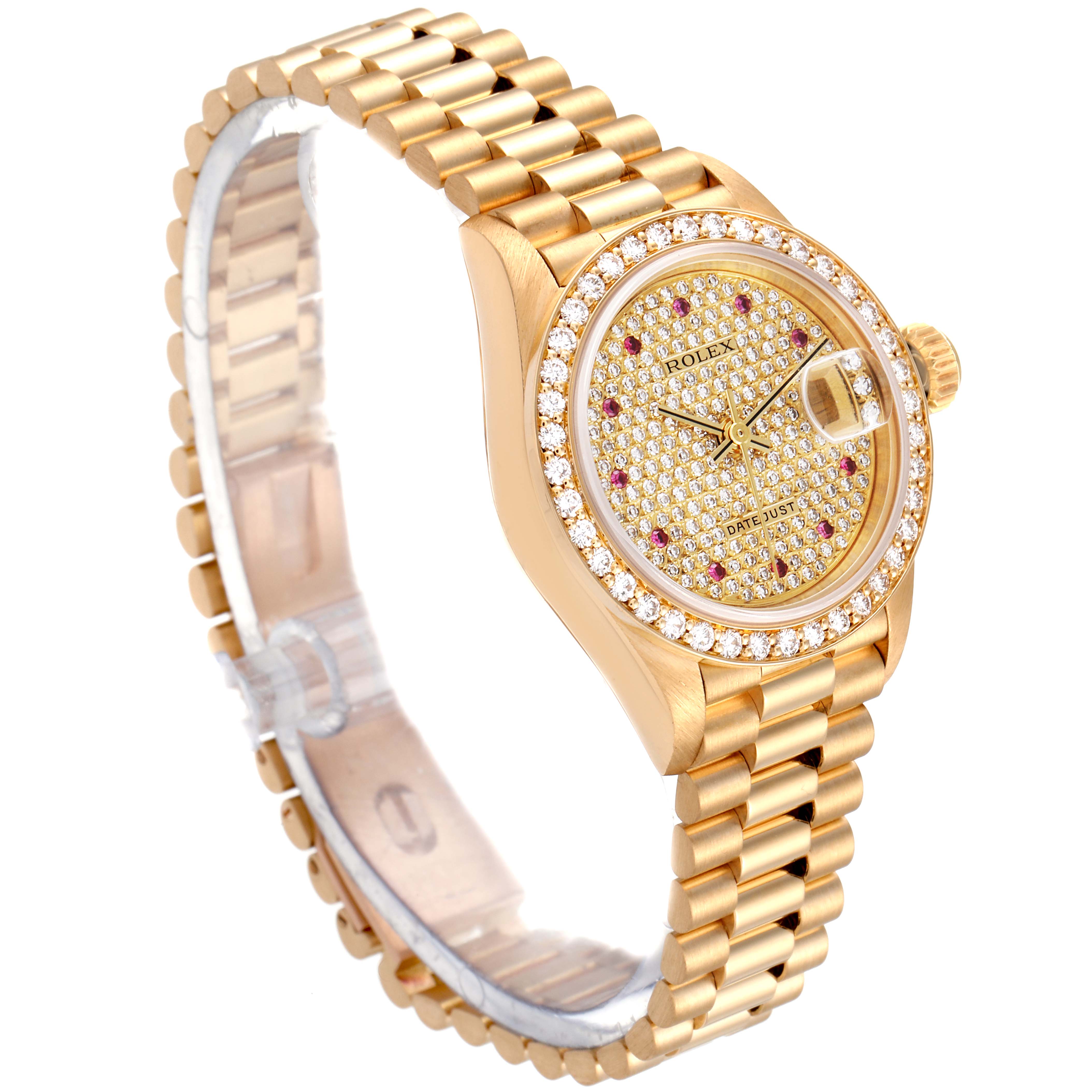 This image shows a Rolex President 69138 Women's Yellow Gold  69138 Women's Yellow Gold  model watch from an oblique angle, highlighting its gold bracelet, diamond bezel, and detailed dial.