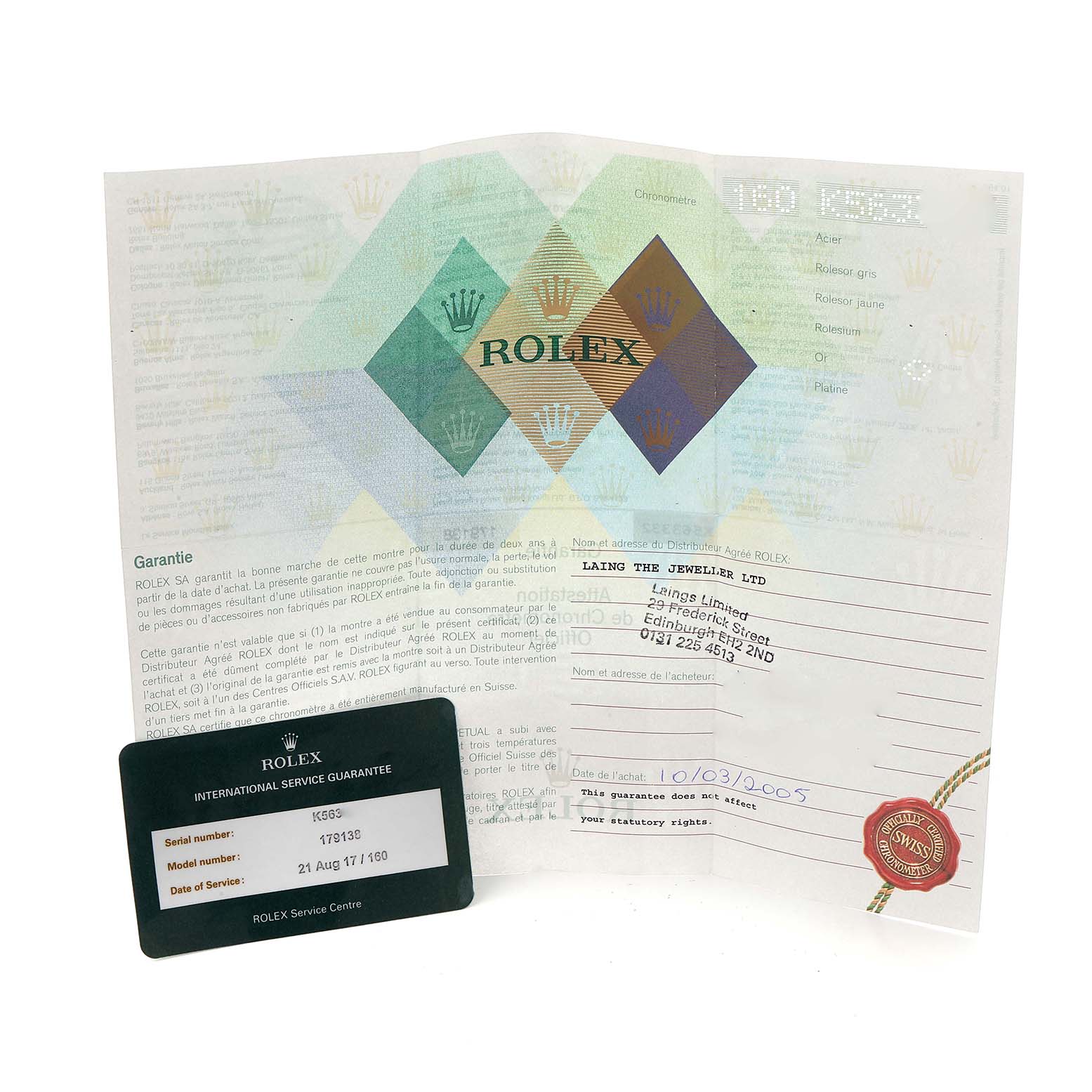 The image shows a Rolex President 179138 Women's Yellow Gold Mother of Pearl Dial 179138 Women's Yellow Gold Mother of Pearl Dial model's warranty card and certificate, both displayed upright.