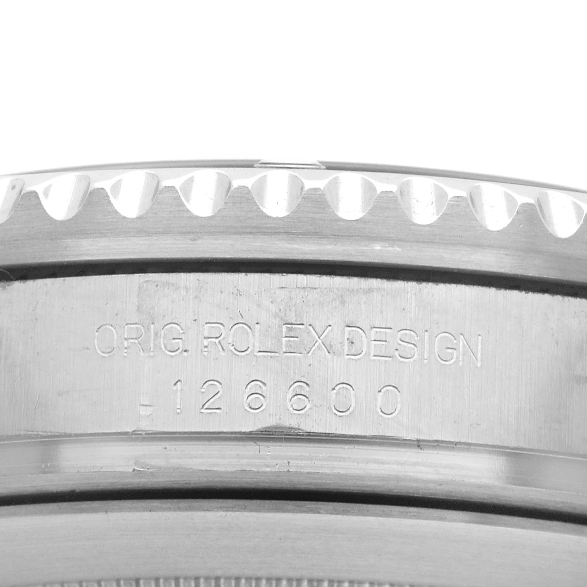 The image shows a close-up of the Rolex Sea-Dweller 126600 Men's Stainless Steel Black Dial 126600 Men's Stainless Steel Black Dial's case side, featuring the model number 126600 and a part of the bezel.