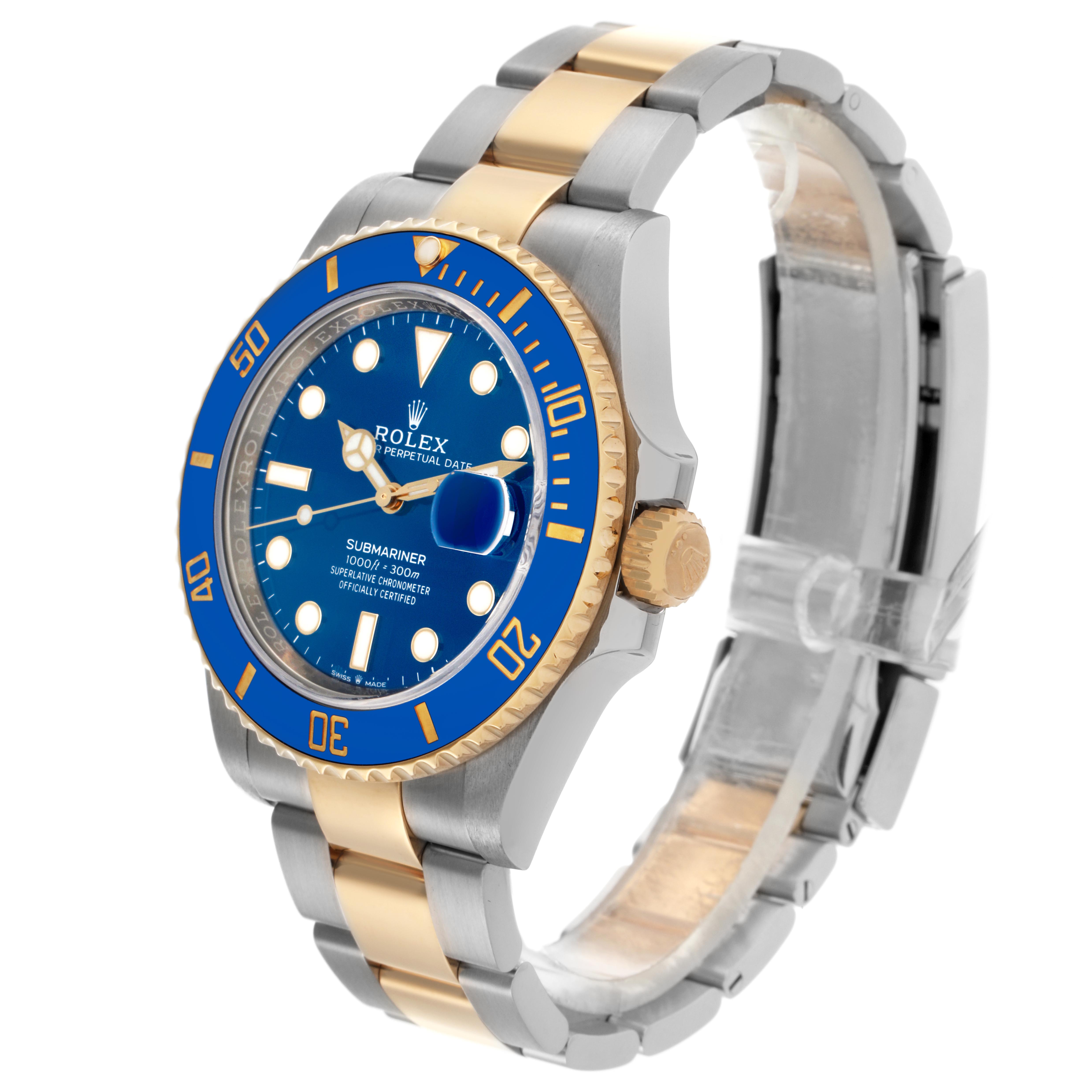 The Rolex Submariner 126613LB Men's Steel and Gold (two tone) Blue Dial 126613LB Men's Steel and Gold (two tone) Blue Dial watch is shown at a three-quarter angle, revealing the blue dial, bezel, crown, and two-tone bracelet.