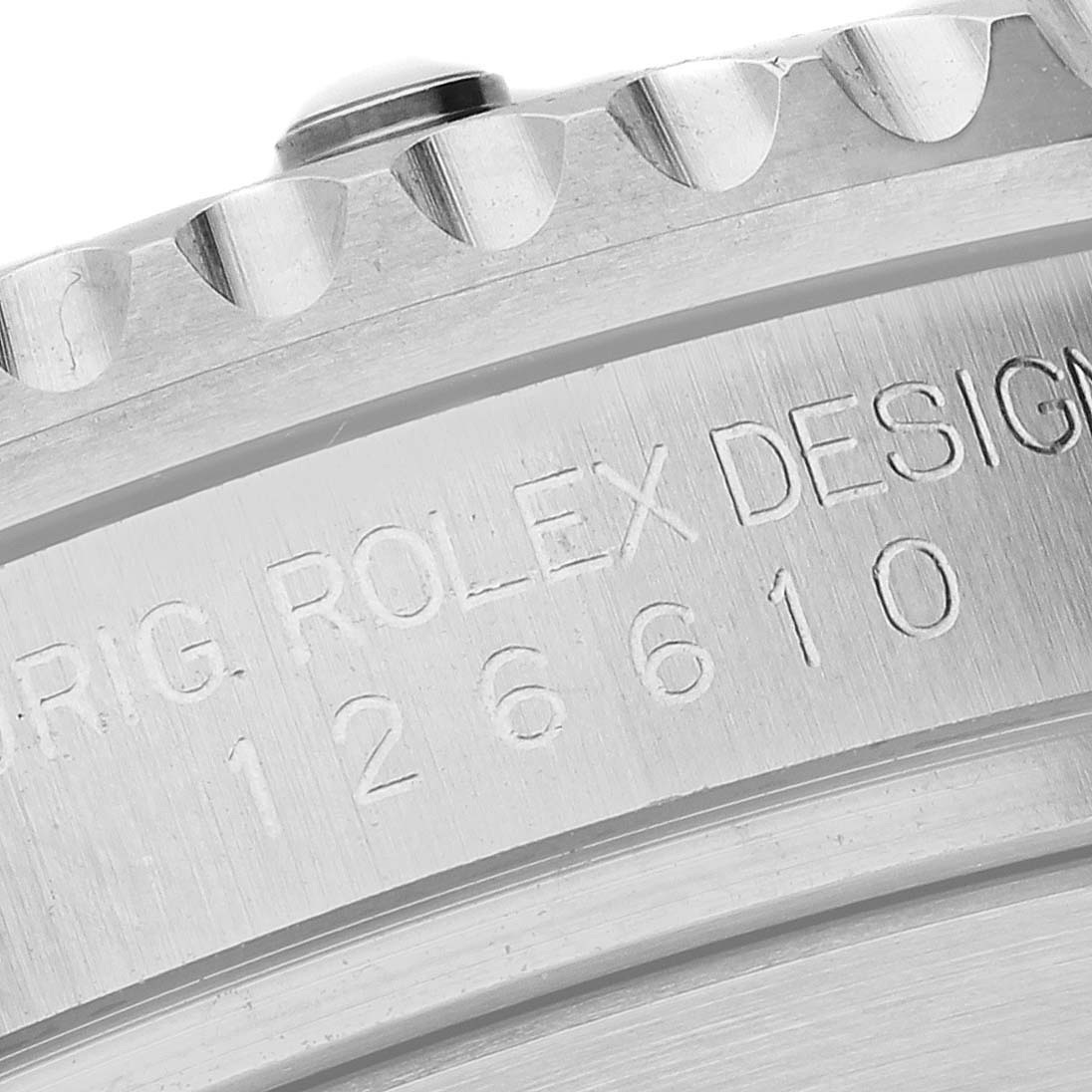 This close-up image shows the engraved reference number and design details on the side of a Rolex Submariner 126610LN Men
s Stainless Steel Black Dial 126610LN Men
s Stainless Steel Black Dial watch case.