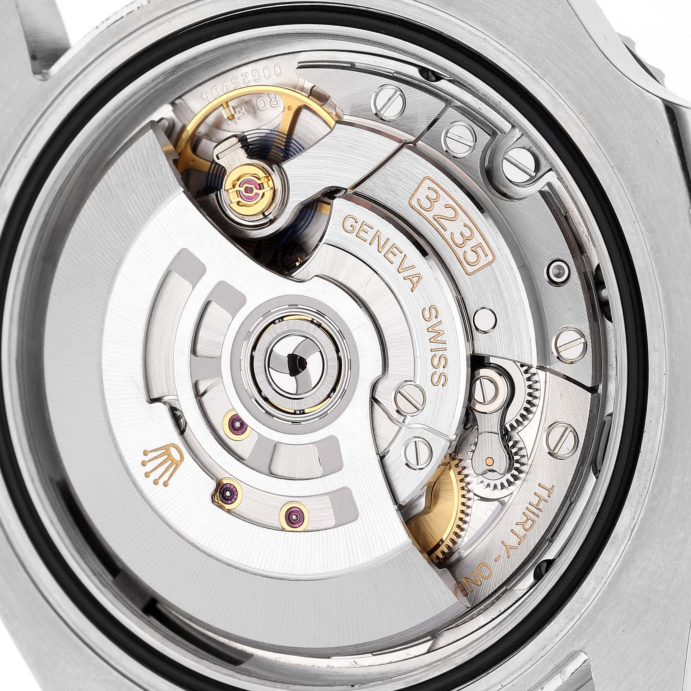 This is an image of the Rolex Submariner 126610LN Men
s Stainless Steel Black Dial 126610LN Men
s Stainless Steel Black Dial
s movement, specifically showcasing the intricate details of its internal mechanism.