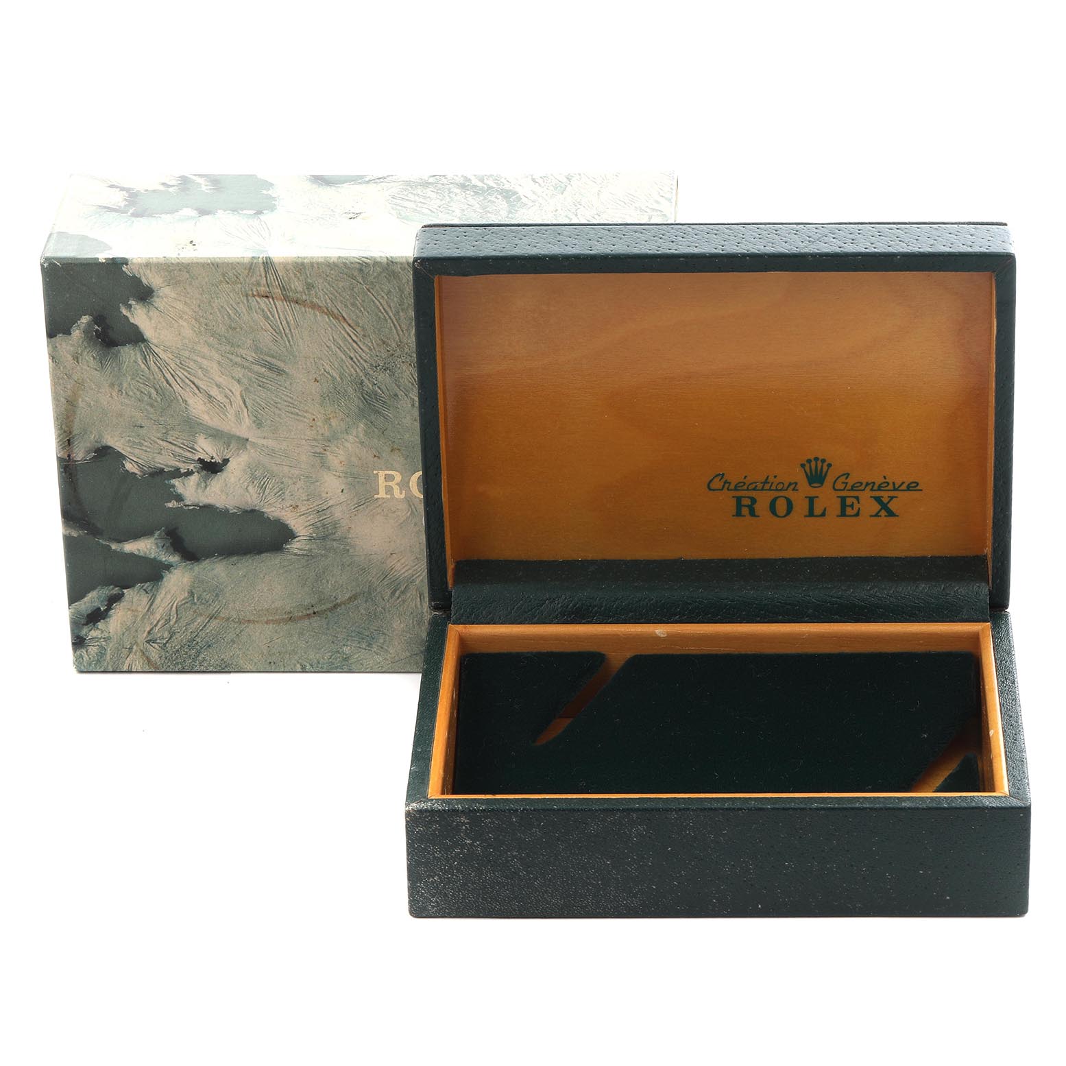 The image shows a Rolex Submariner 16610 Men's Stainless Steel Black Dial 16610 Men's Stainless Steel Black Dial watch box, open with branding inside, and an outer sleeve with a textured design.