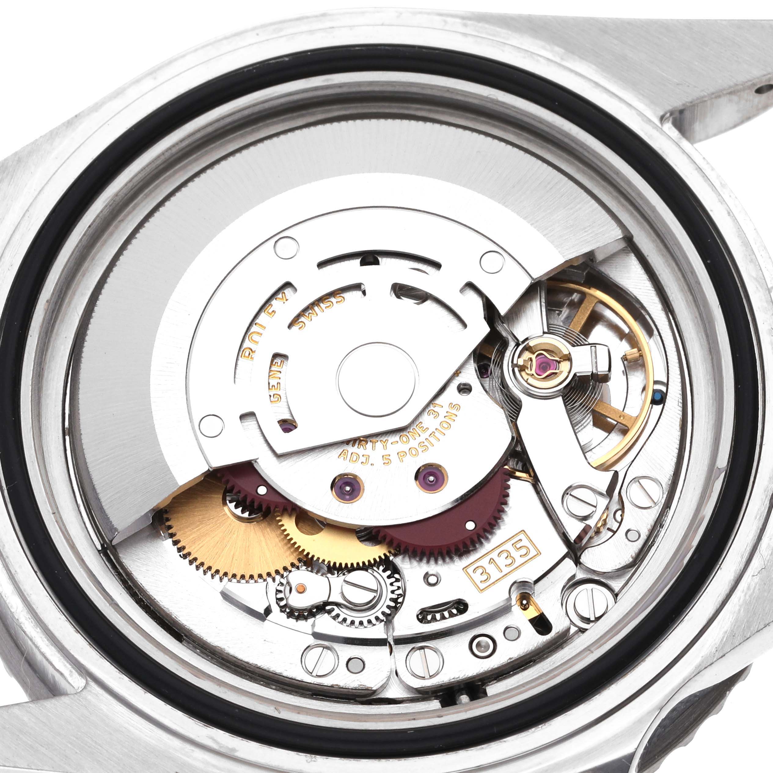 This image shows the internal movement mechanism of a Rolex Submariner 16610 Men
s Stainless Steel Black Dial 16610 Men
s Stainless Steel Black Dial watch from a rear angle.