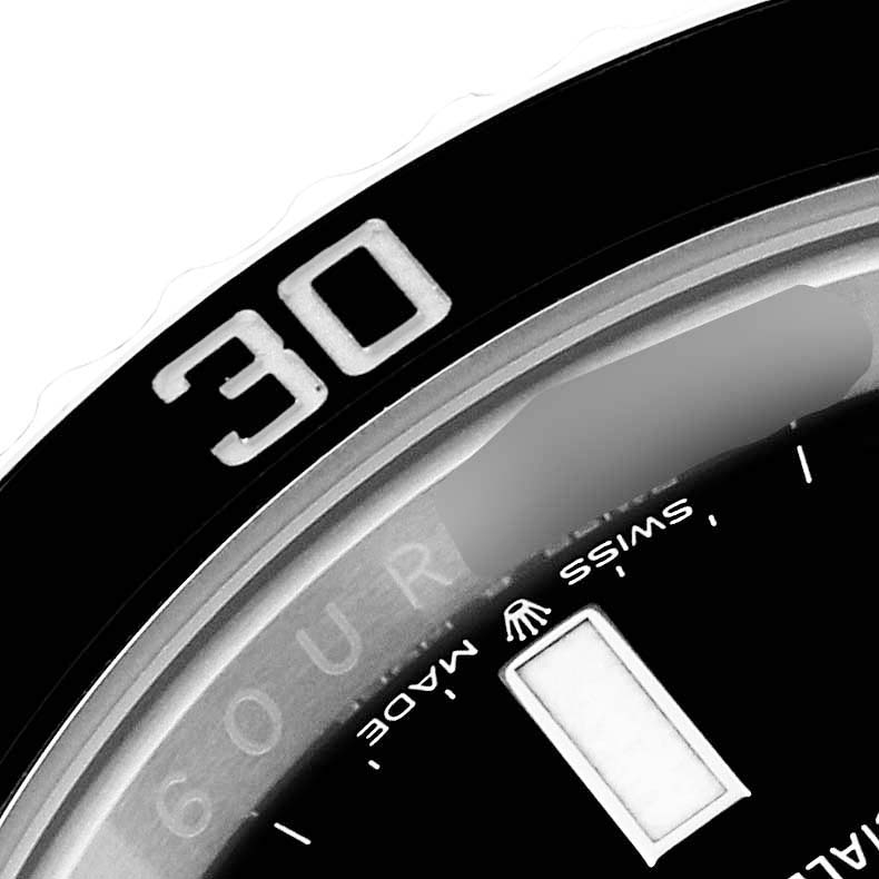 The image shows a close-up of the bezel and dial of a Rolex Submariner 124060 Men
s Stainless Steel Black Dial 124060 Men
s Stainless Steel Black Dial, highlighting the "30" mark and a portion of the text on the dial.