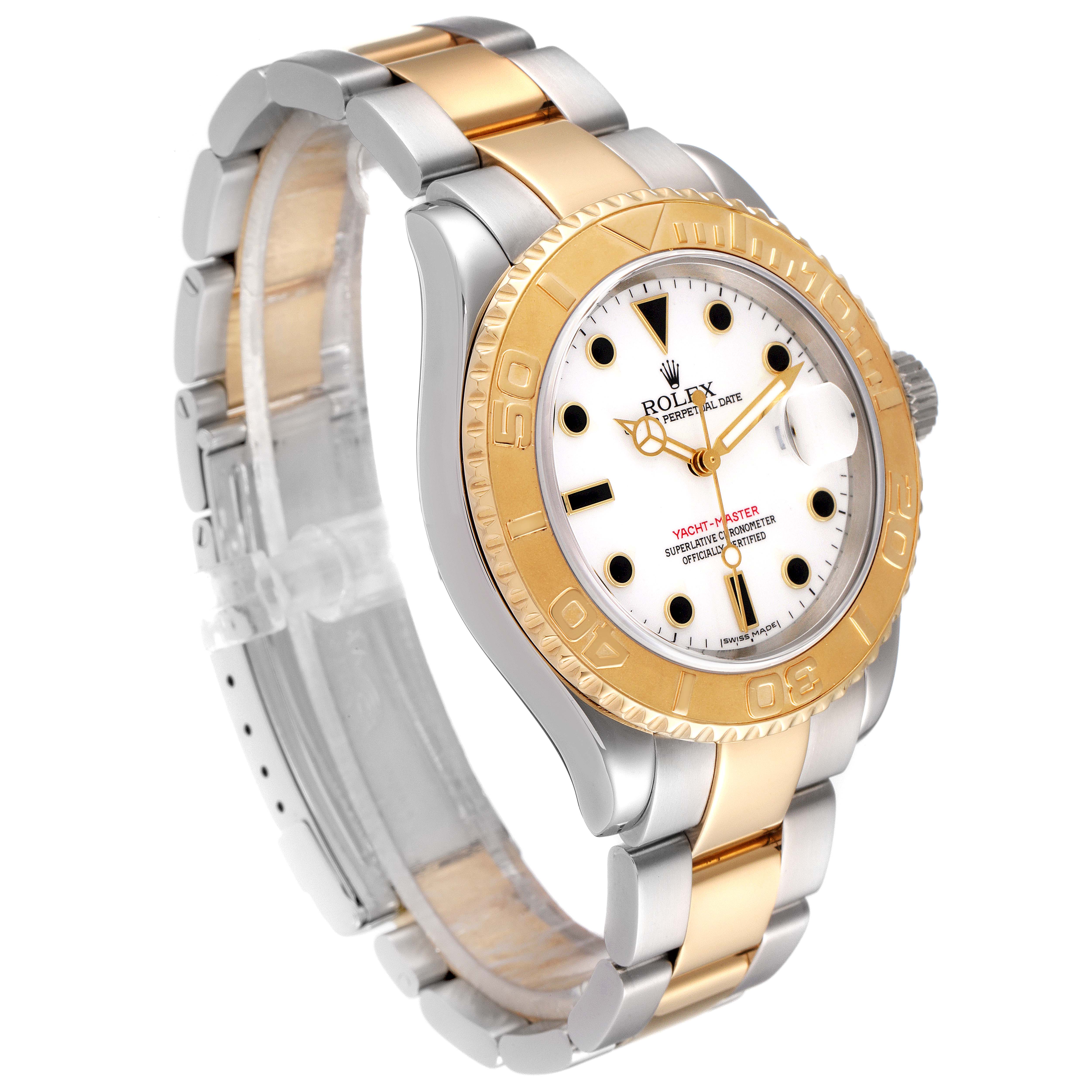 The Rolex Yacht-Master 16623 Men
s Steel and Gold (two tone) White Dial 16623 Men
s Steel and Gold (two tone) White Dial watch is shown at a front angle, highlighting its dial, bezel, and two-tone bracelet.