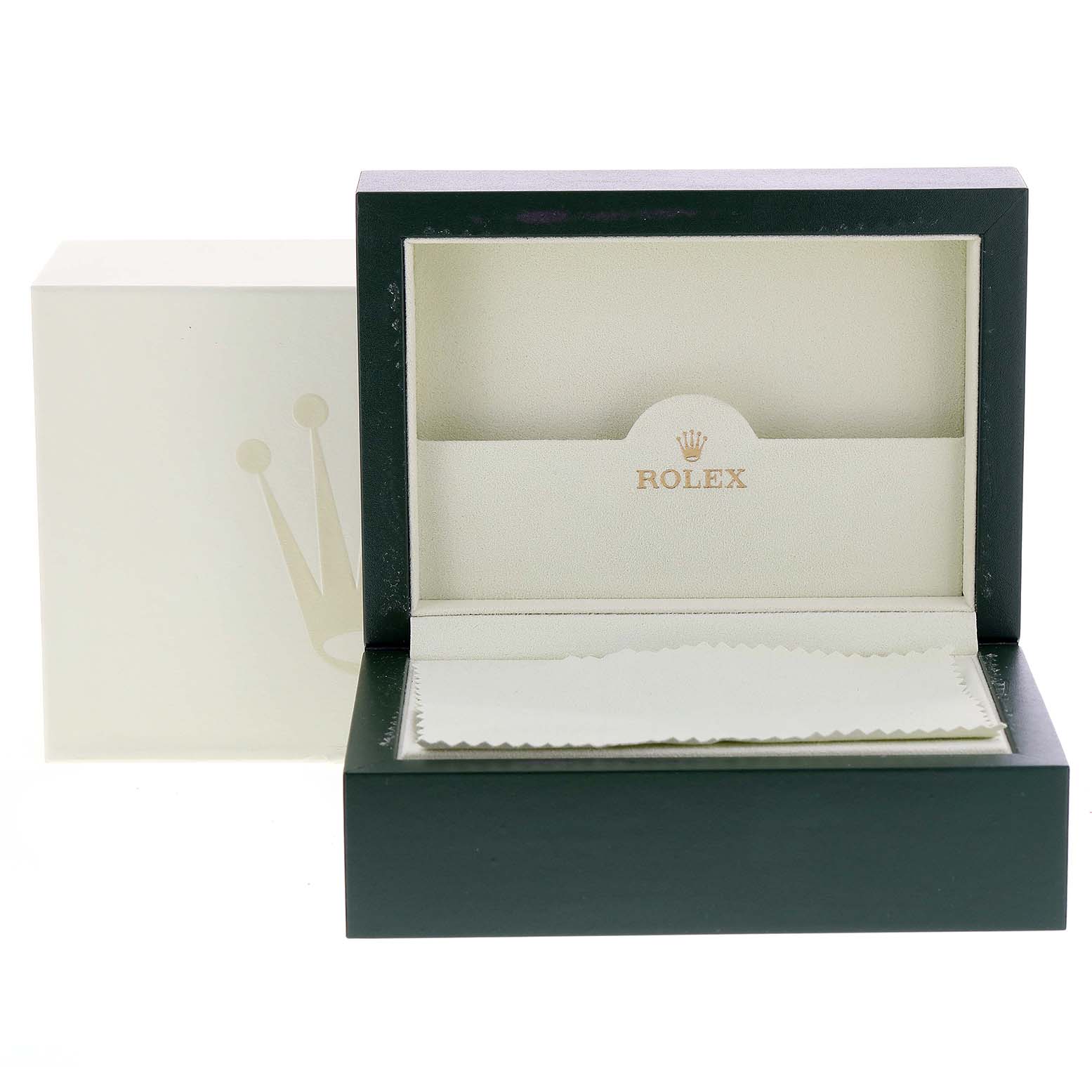 The image shows the open box for the Rolex Yacht-Master 16623 Men
s Steel and Gold (two tone) White Dial 16623 Men
s Steel and Gold (two tone) White Dial watch with a cleaning cloth inside.