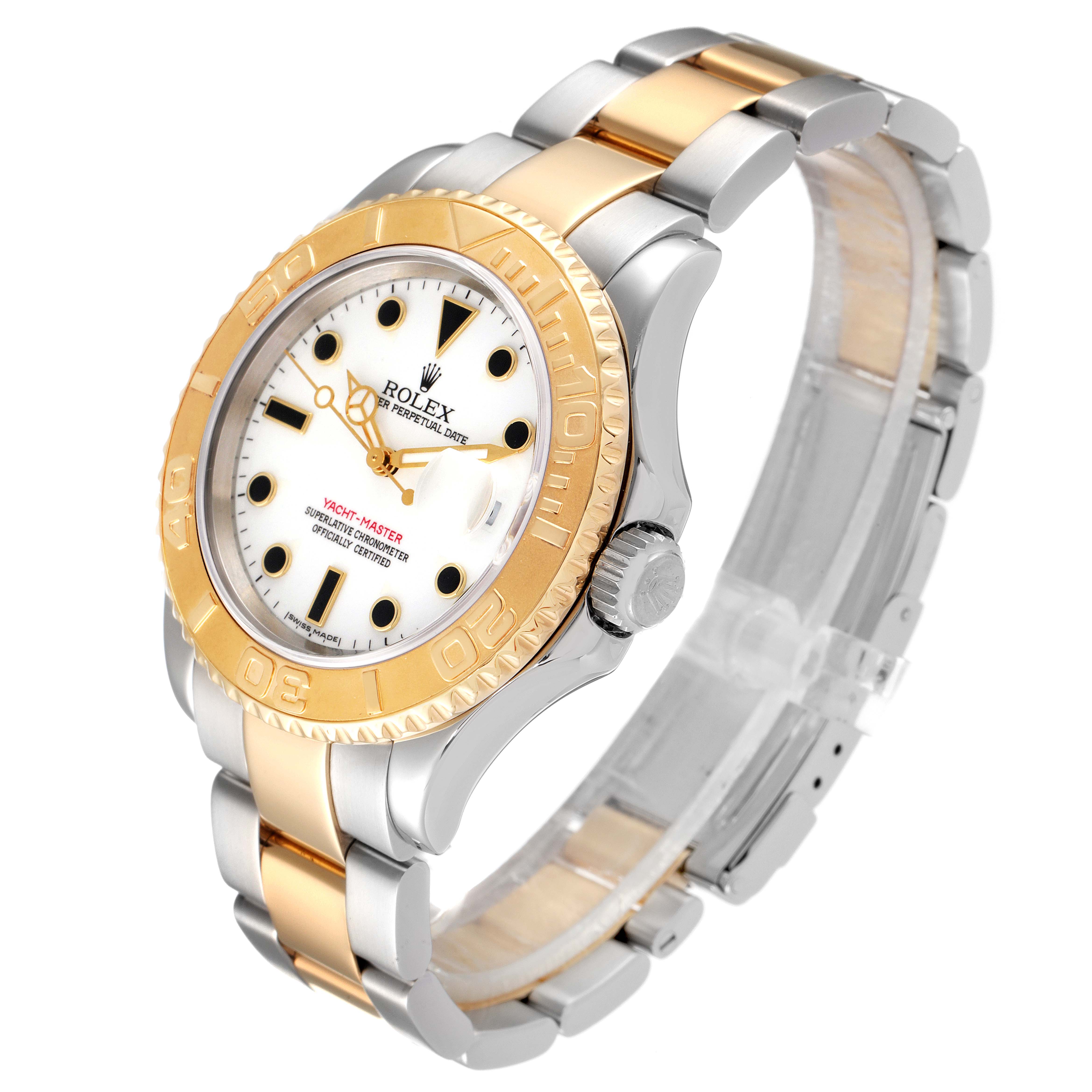 The Rolex Yacht-Master 16623 Men
s Steel and Gold (two tone) White Dial 16623 Men
s Steel and Gold (two tone) White Dial watch is shown at an angle displaying its face, crown, two-tone bracelet, and bezel.