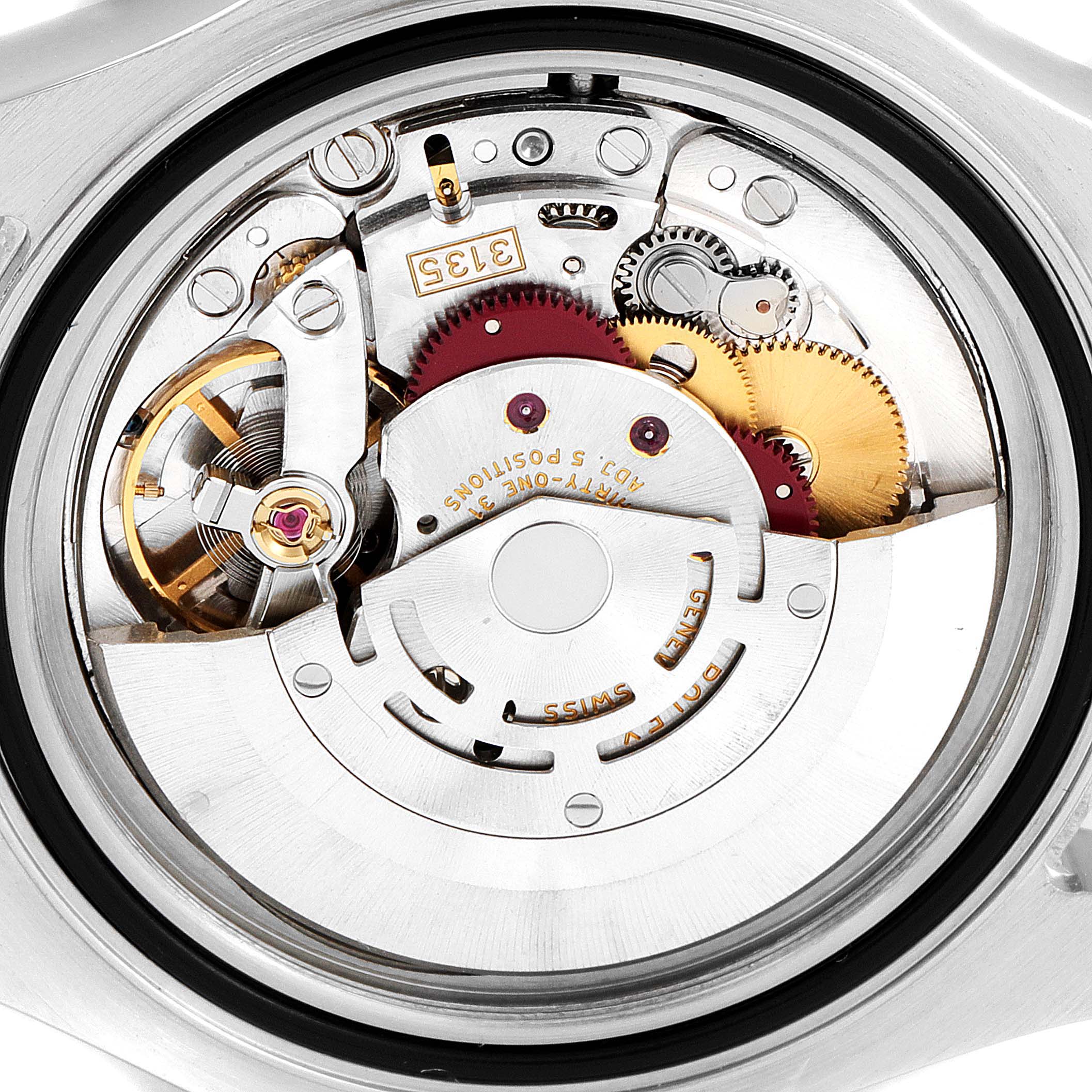 This close-up image shows the intricate movement and inner workings of a Rolex Yacht-Master 16623 Men
s Steel and Gold (two tone) White Dial 16623 Men
s Steel and Gold (two tone) White Dial watch.