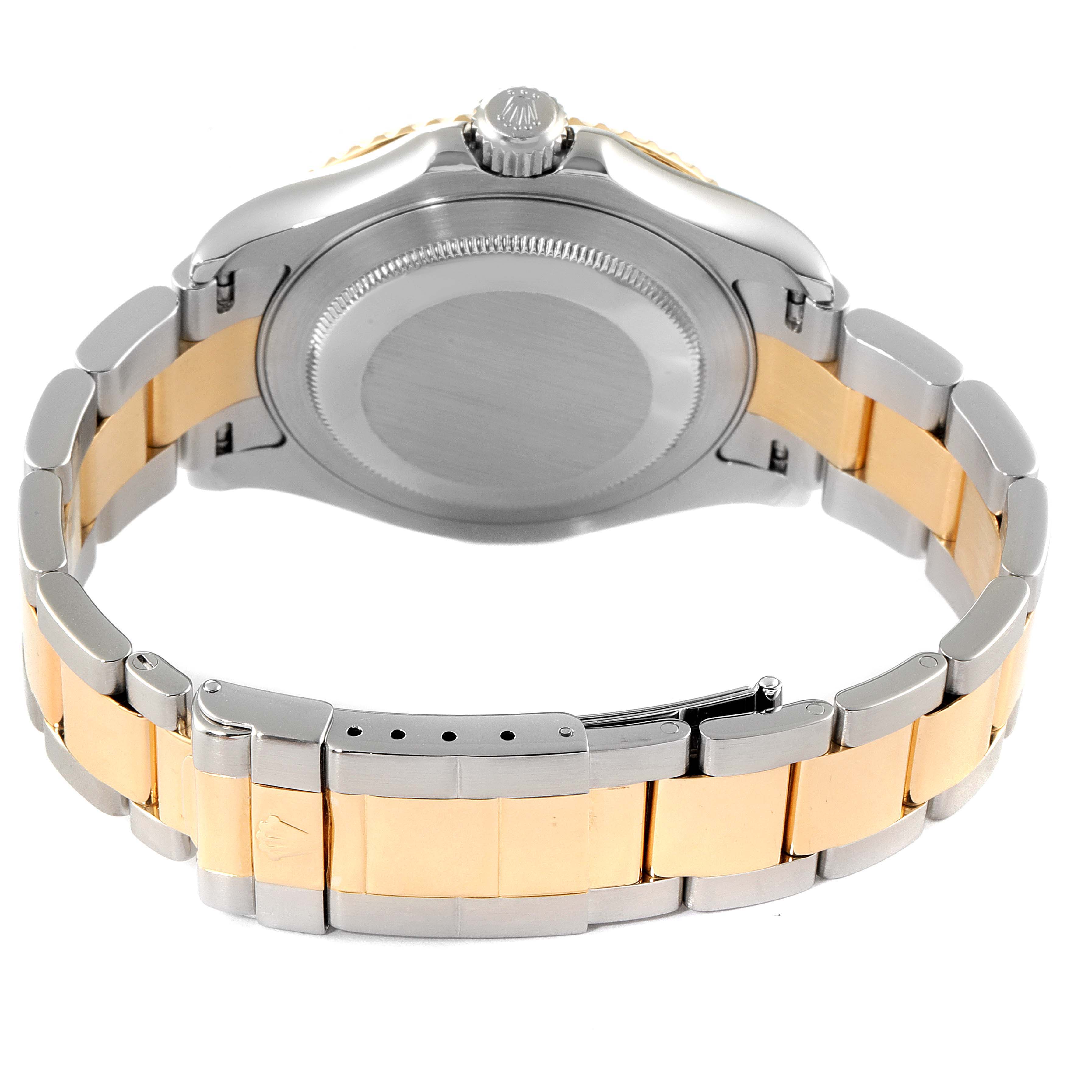 The image shows the back view of the Rolex Yacht-Master 16623 Men
s Steel and Gold (two tone) White Dial 16623 Men
s Steel and Gold (two tone) White Dial watch, emphasizing its case and two-tone bracelet.